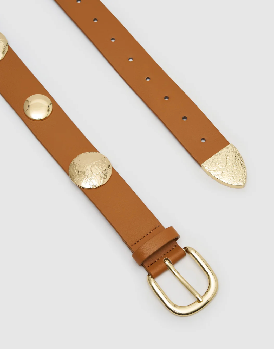 Jesse Belt is a faux leather belt with gold embellishments in tan colourway