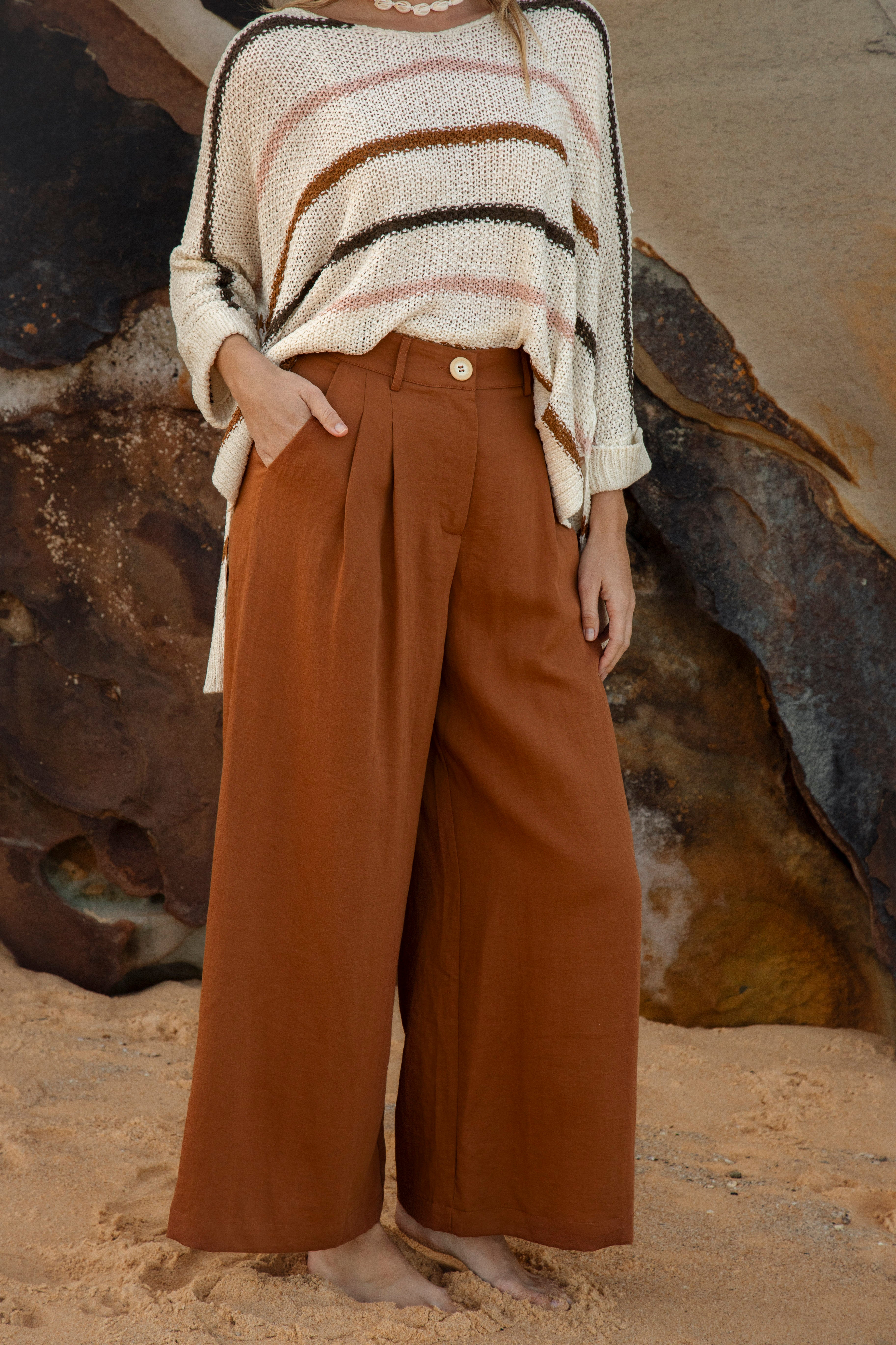 Sol Pant is a high waisted wide leg pant in ochre colourway