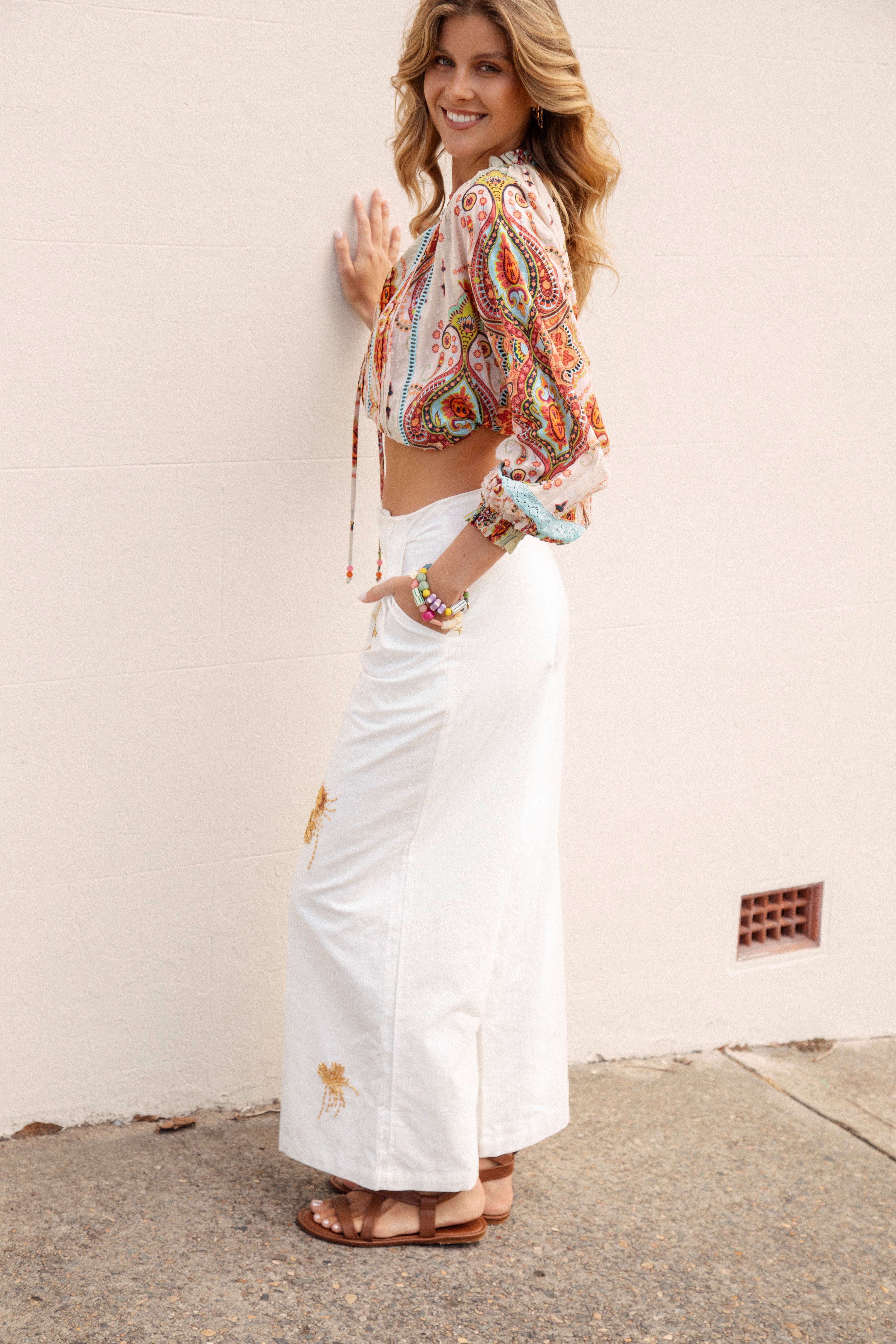 Adriana Embellished Pants - white pant featuring gold sun embellishment