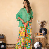 Aloha Vacay Pant featuring vibrant colourful pattern, drawstring waist and wide leg style