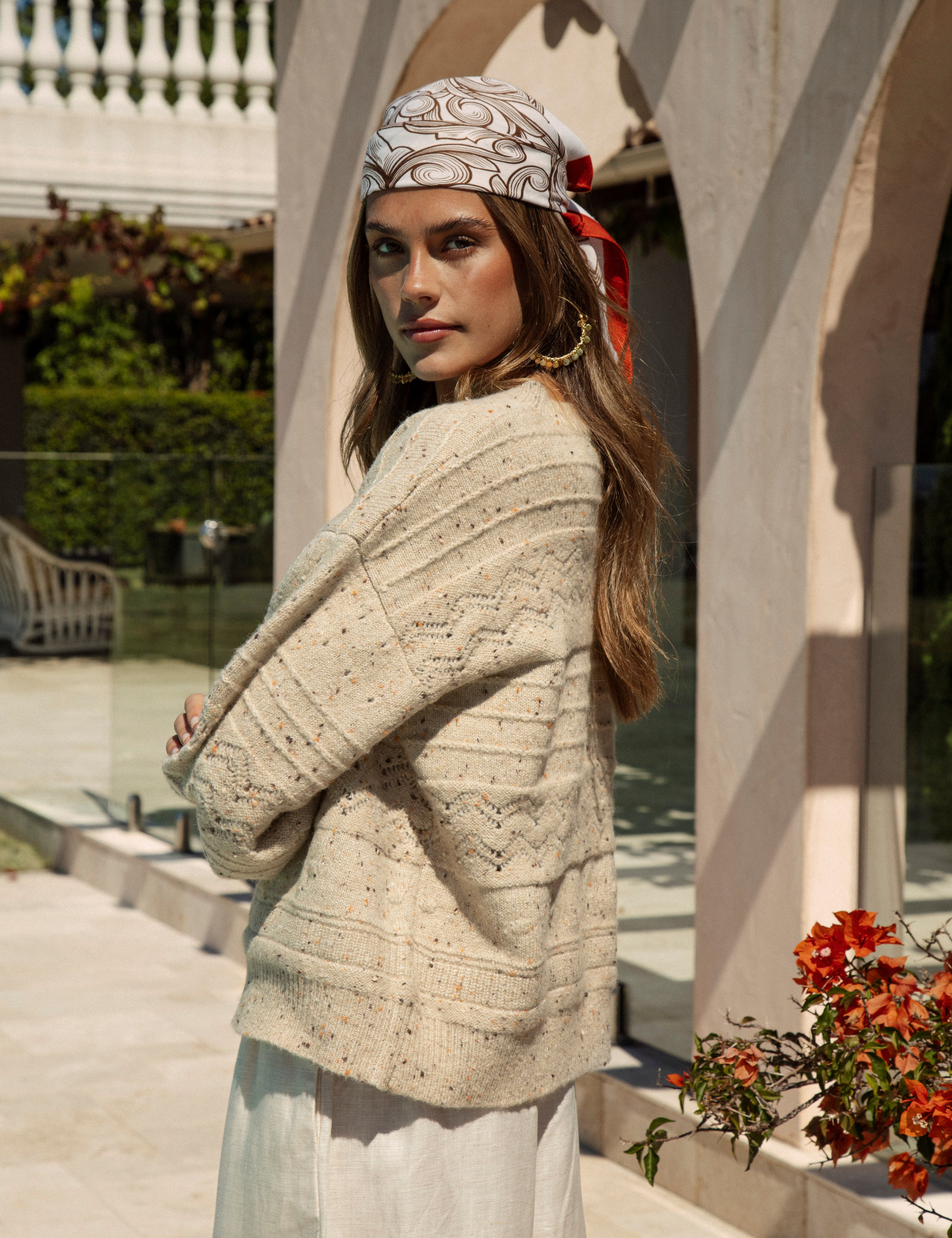 Amalfi Sweater Sand - side view showcasing drop shoulder style and flecked cream colourway