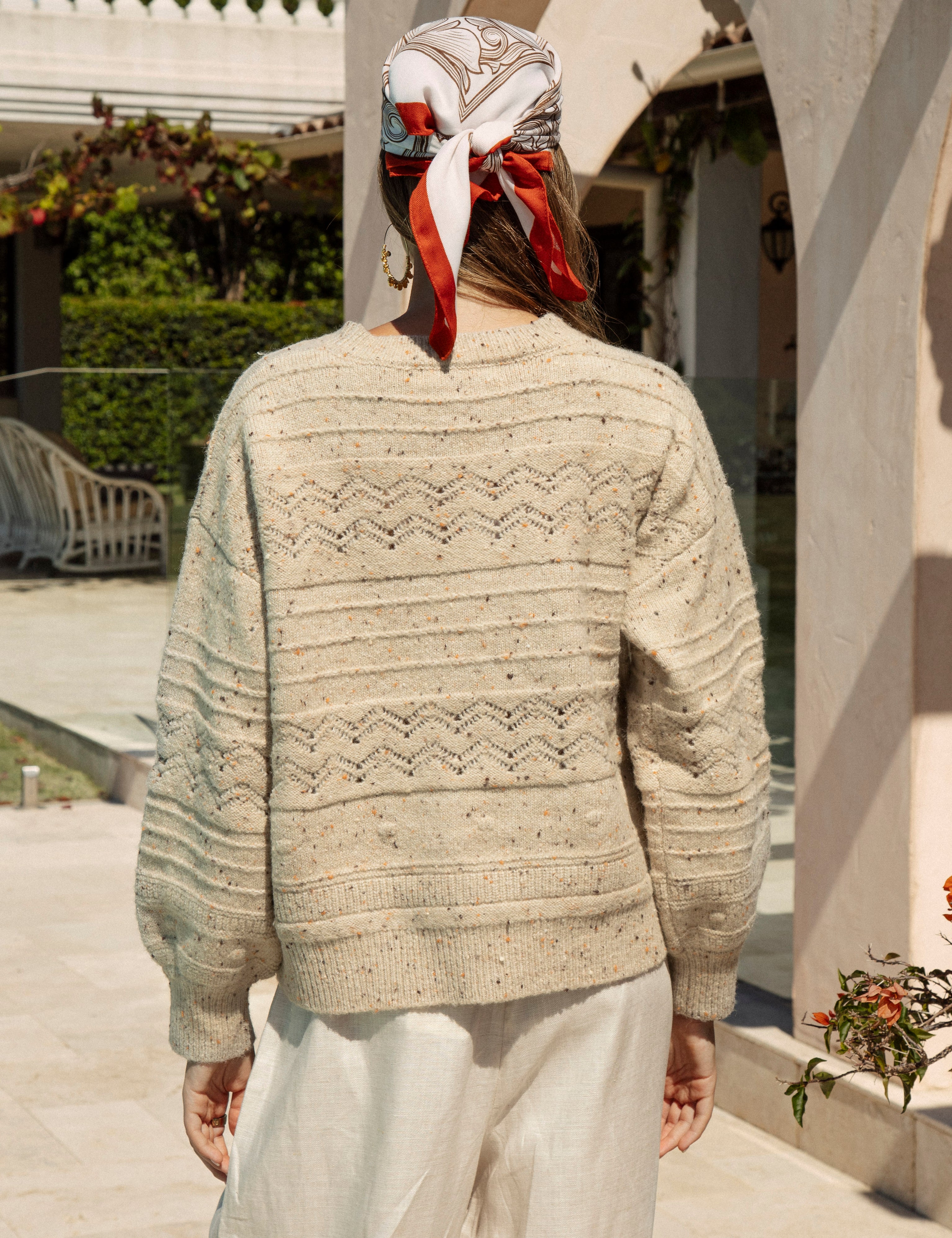 Amalfi Sweater Sand featuring flecked knit in beige colourway