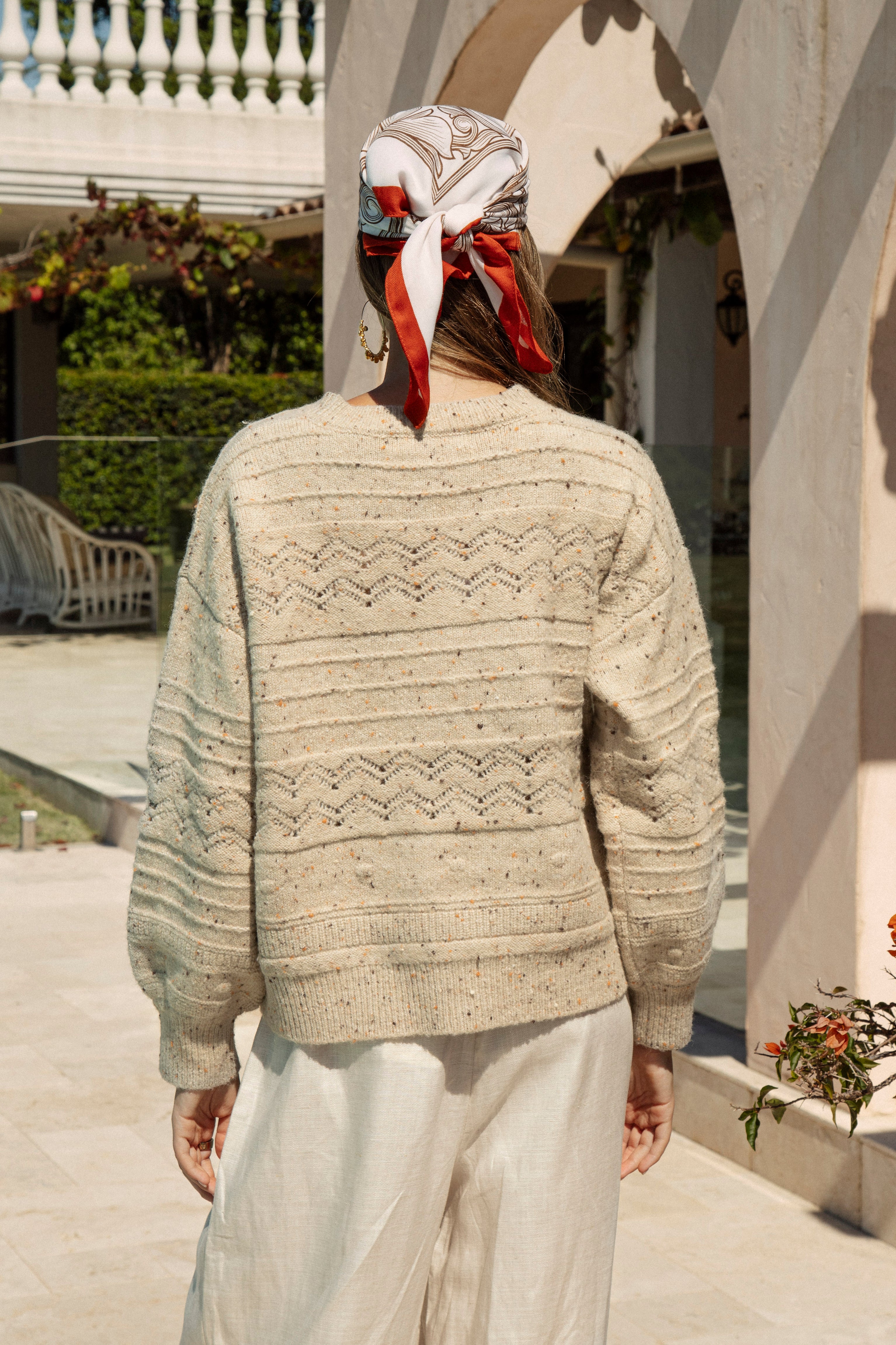 Amalfi Sweater Sand featuring flecked knit in beige colourway