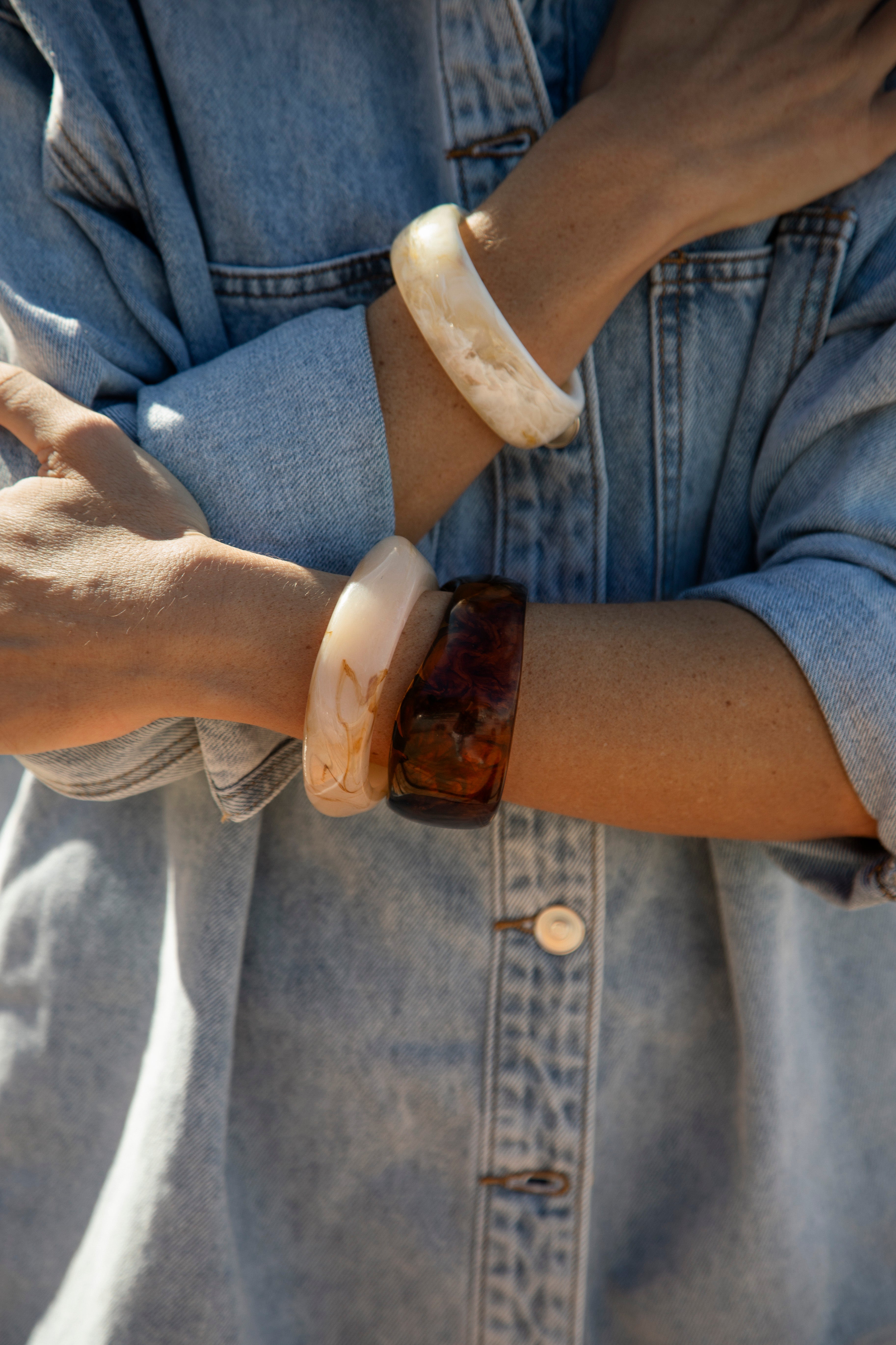 Amber Glow Chunky Resin Bangle - tortoiseshell bangle worn with denim