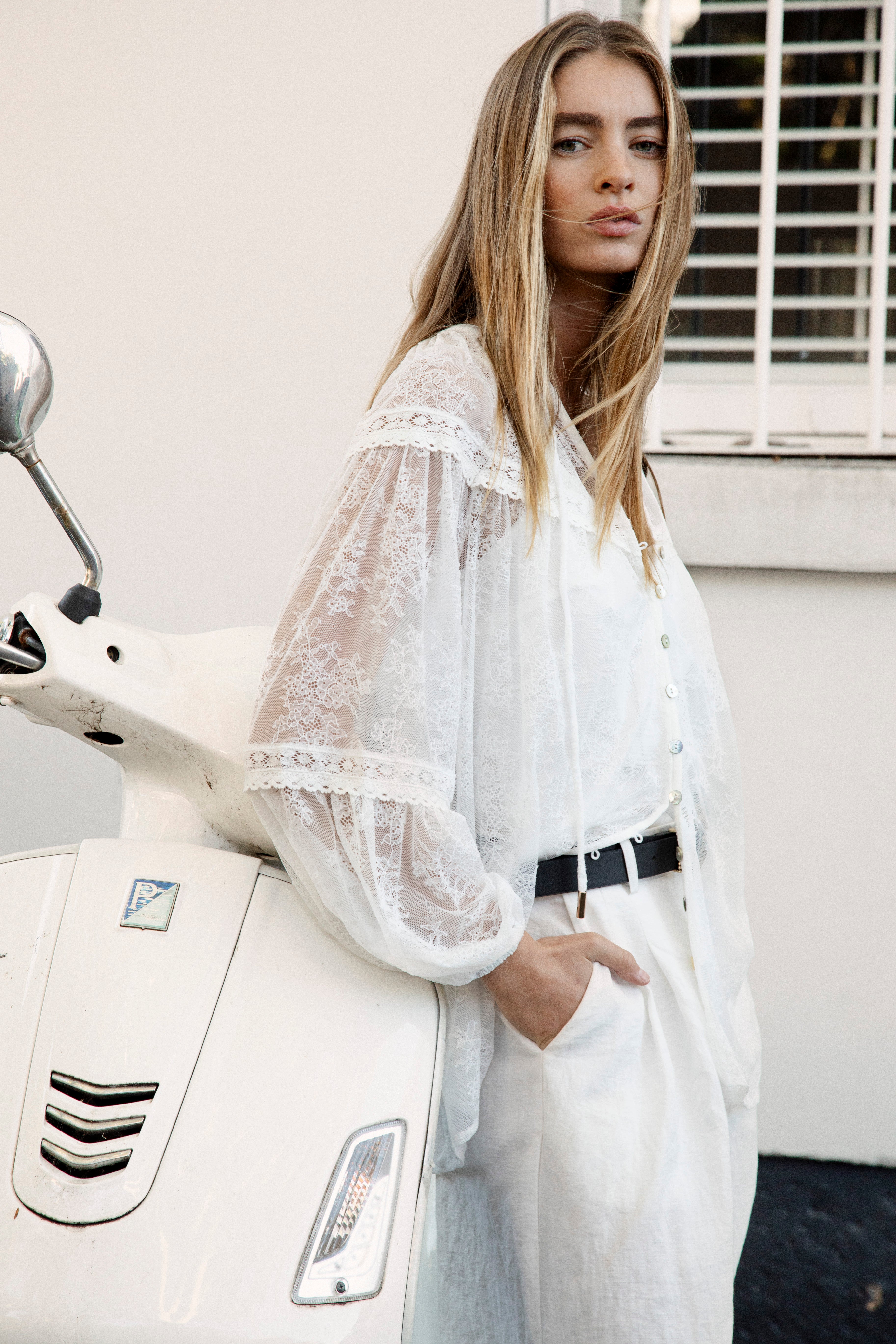 Amour Lace Blouse White - side view showcasing billowy sleeves and lace details