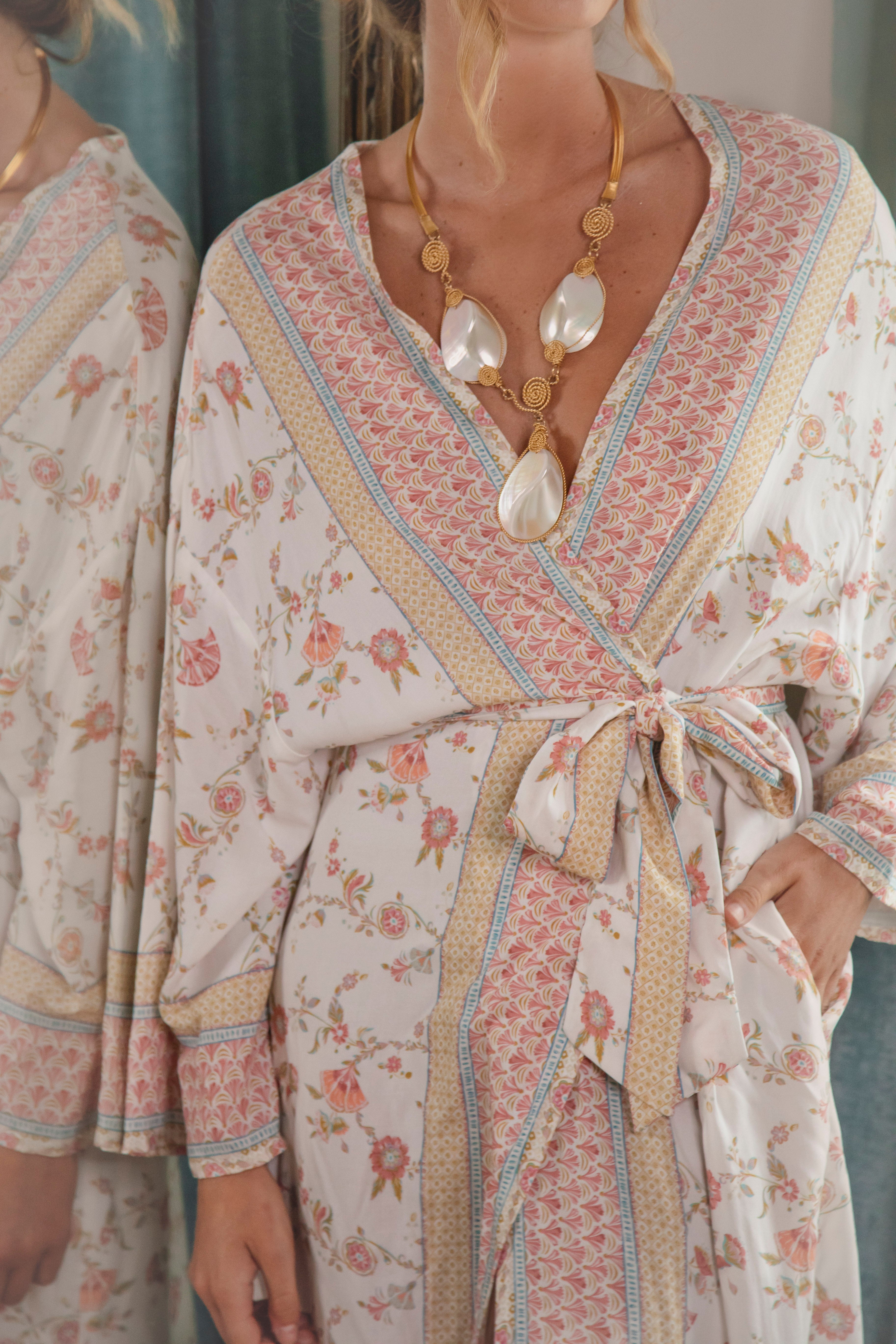 Antique Pearl Kimono - close up view of Delilah floral pattern with contrast hem.