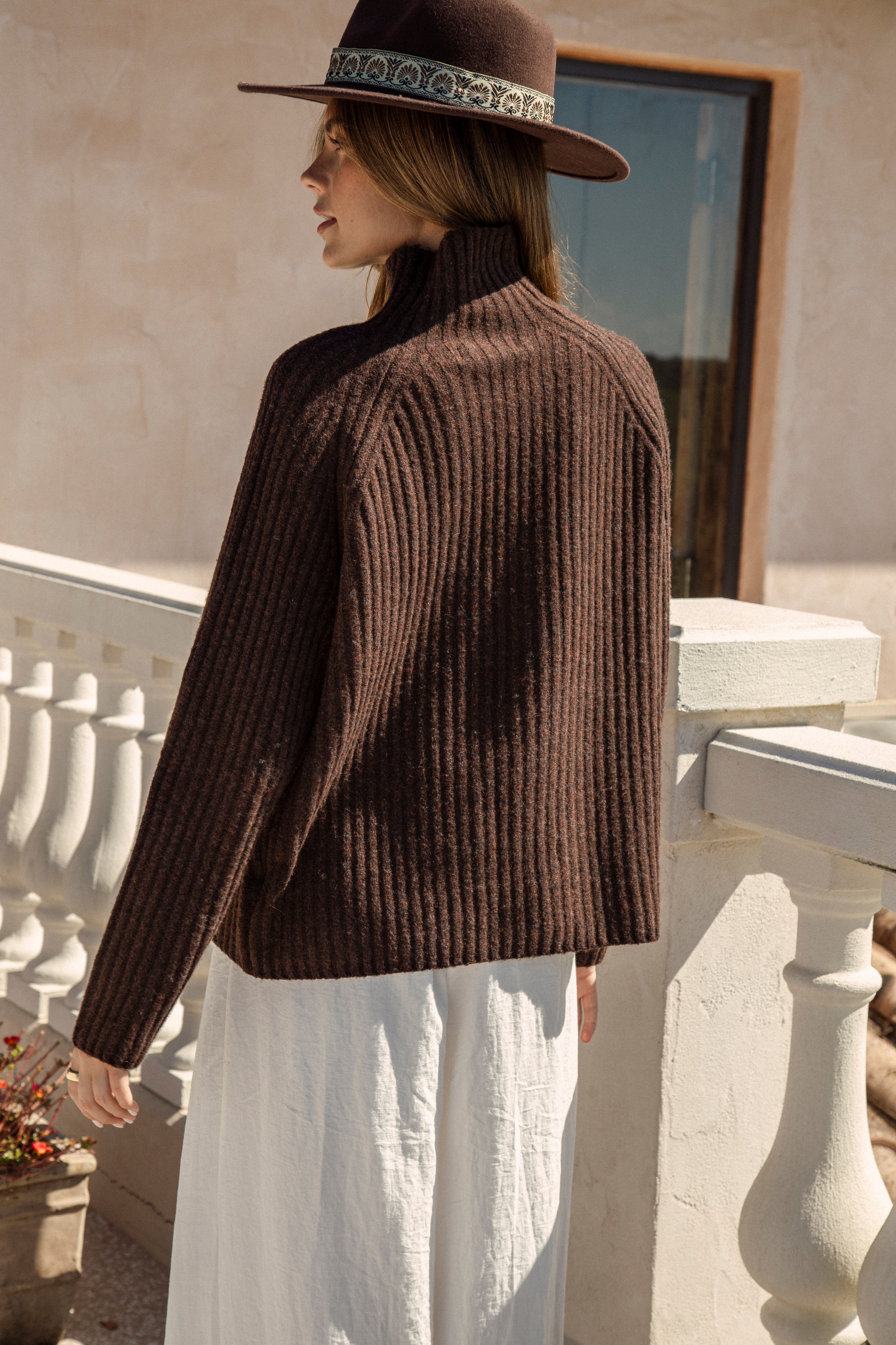 Arlo Jumper Chocolate - rear view showcasing high neckline and brown colourway