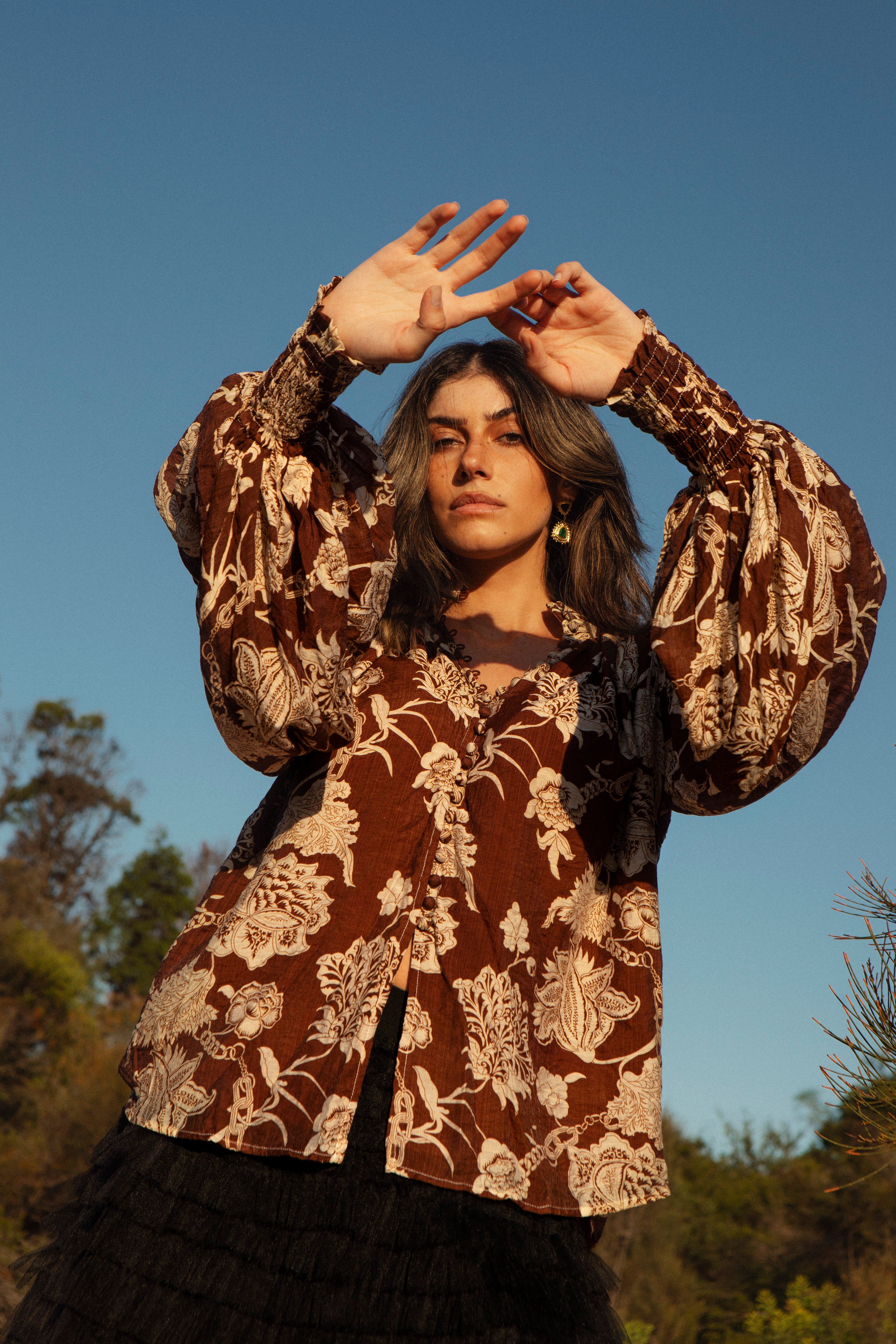 Aurora Blouse Desert Muse showcasing shirred cuffs and billowy sleeves