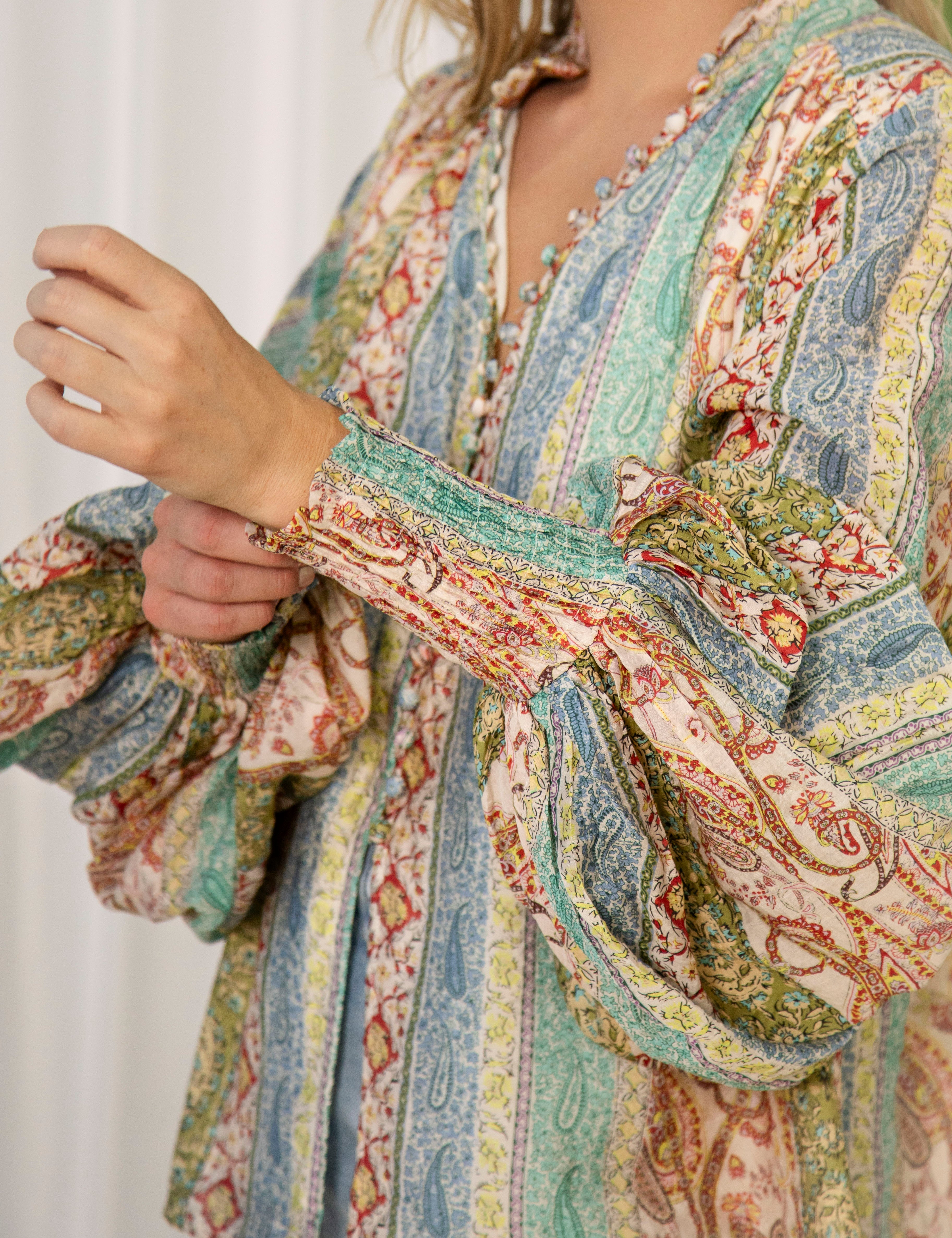 Aurora Blouse Dream showcasing boho print and elasticised cuffs on billowy sleeves