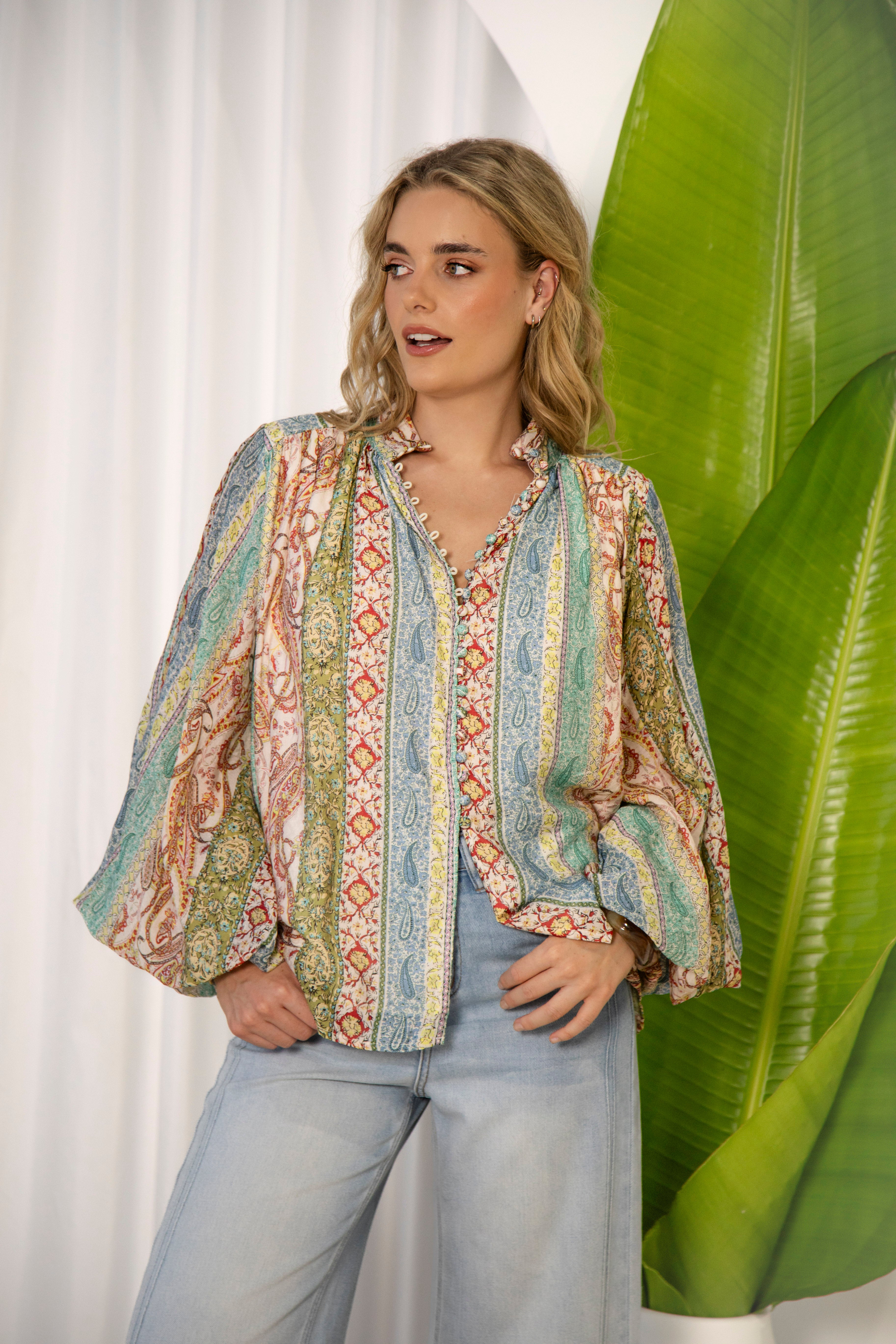 Aurora Blouse Dream showcasing mandarin collar, fabric covered buttons and button down style