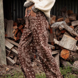 Bandit Barrel Jean is a brown pant featuring cream pattern in paisley bandana style.
