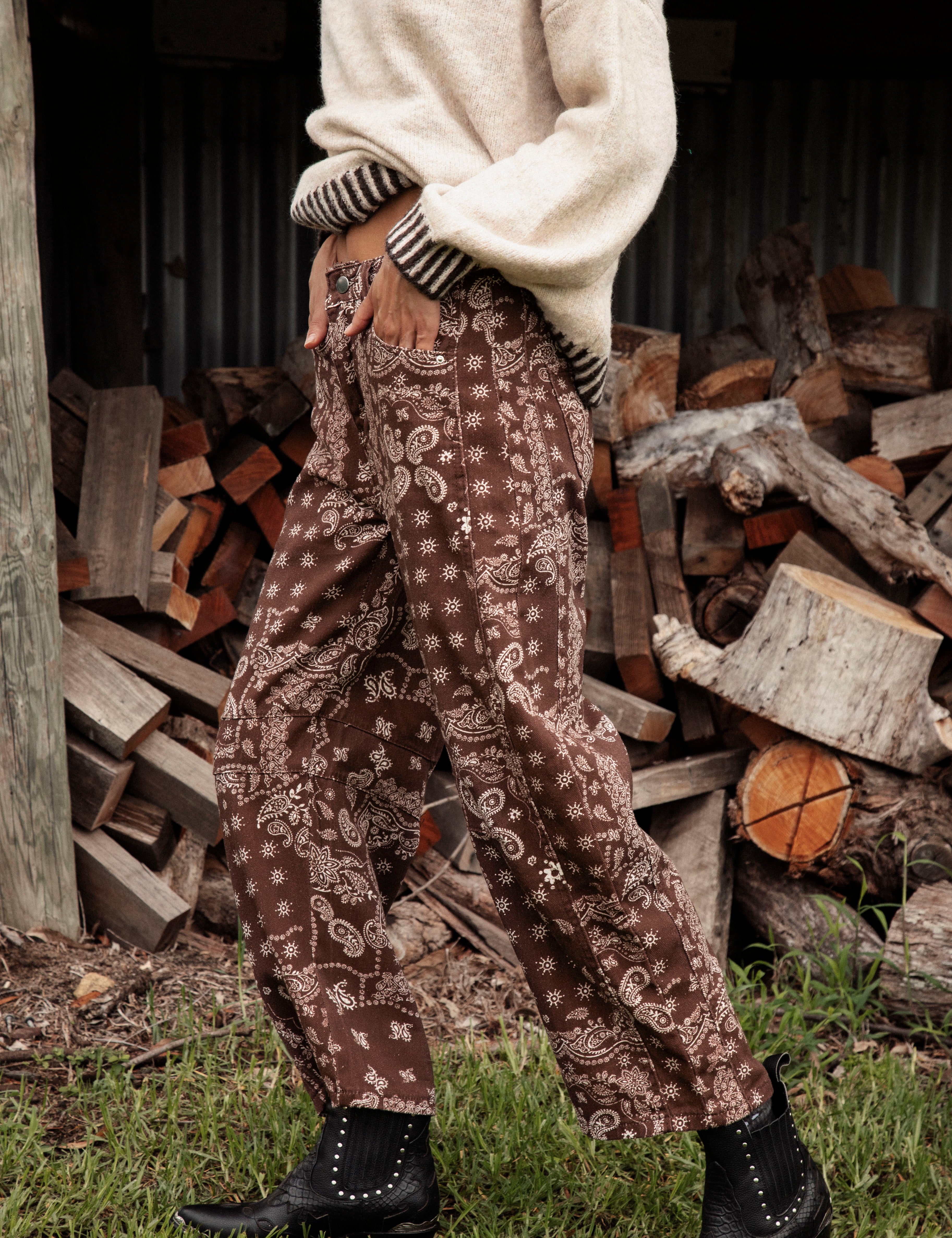 Bandit Barrel Jean is a brown pant featuring cream pattern in paisley bandana style.