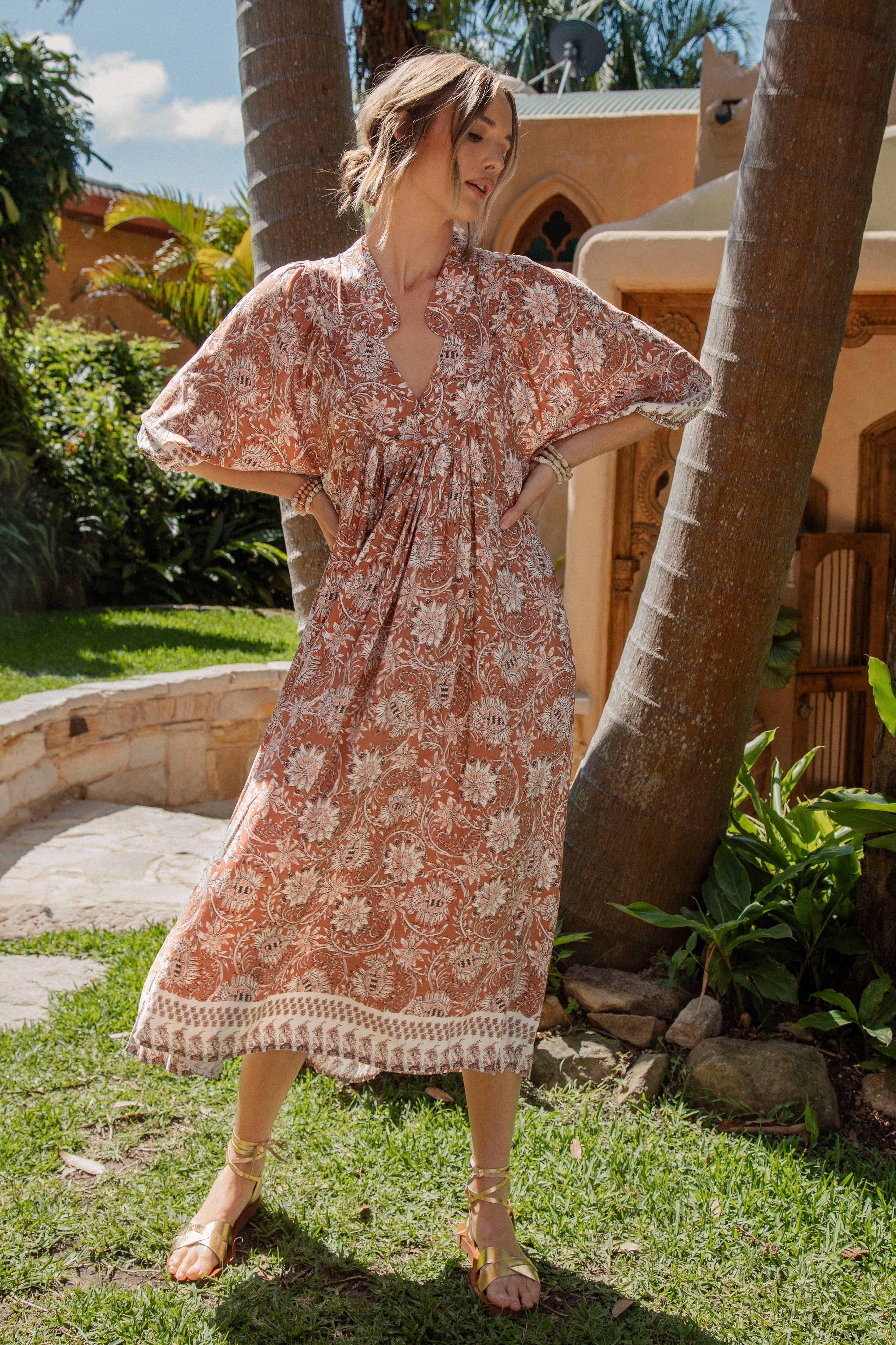 Boheme Midi Dress Indah features a Boho inspired pattern in brown colourway with contrasting trim