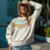 Bondi Slouch Knit is a casual sweater in shades of cream, brown and blue.
