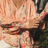 Bouquet Blouse featuring shirred cuff detail