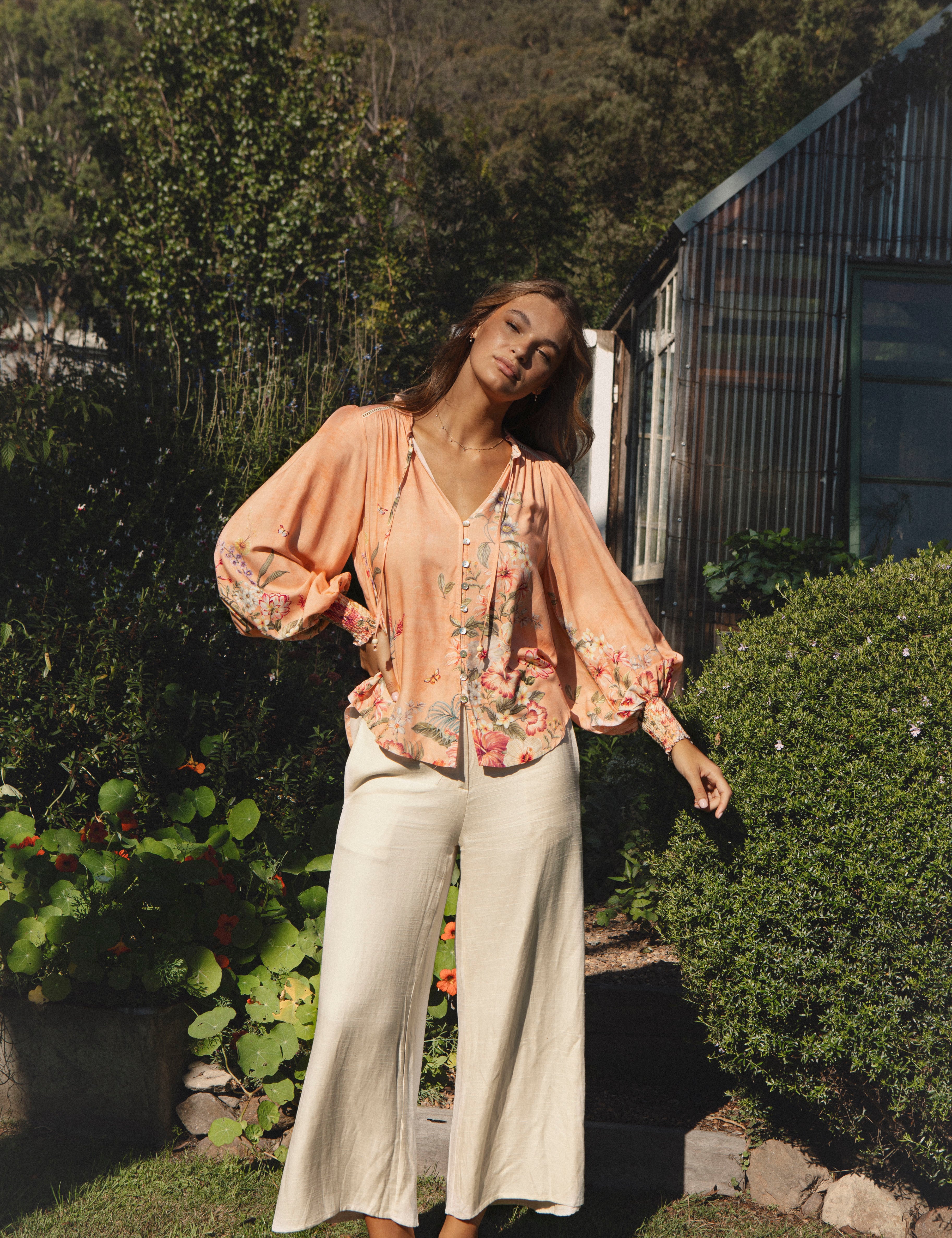 Bouquet Blouse featuring long billowy sleeves and floral print