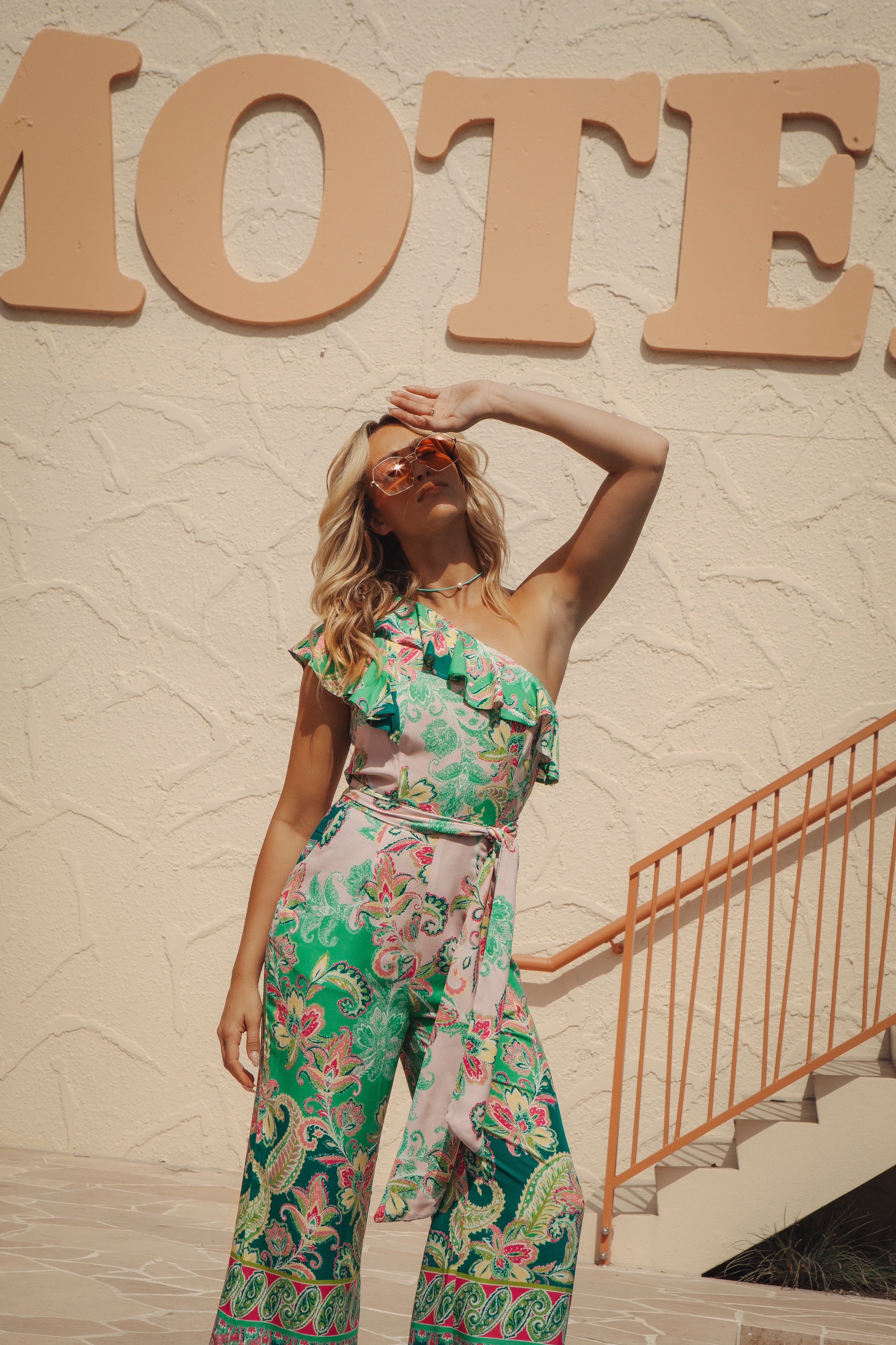 Cantina Jumpsuit Paisley Paradise features a beautiful retro paisley pattern in shades of pink and green