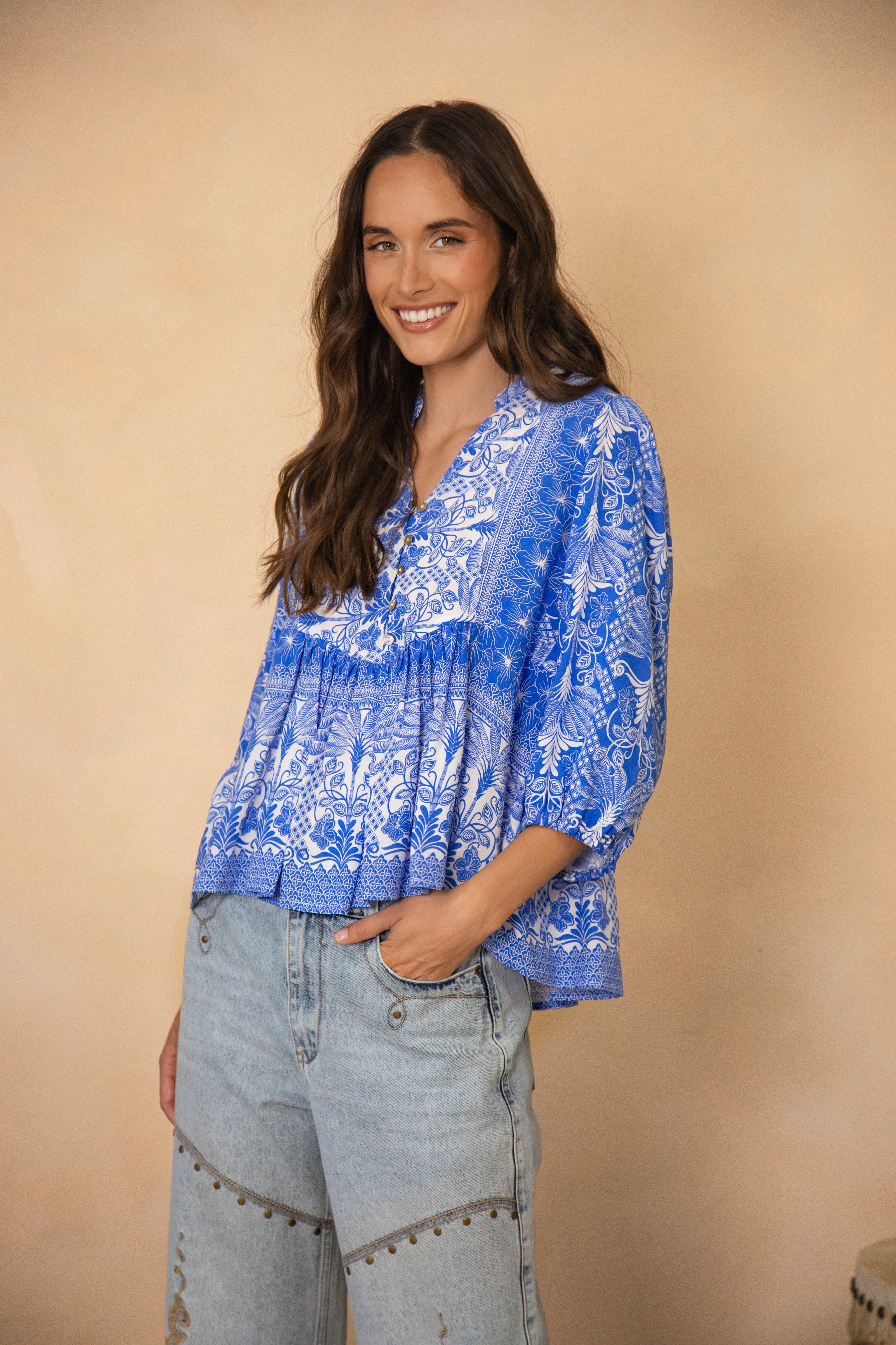 Caspian Blouse featuring vintage inspired white and blue pattern and Boho style