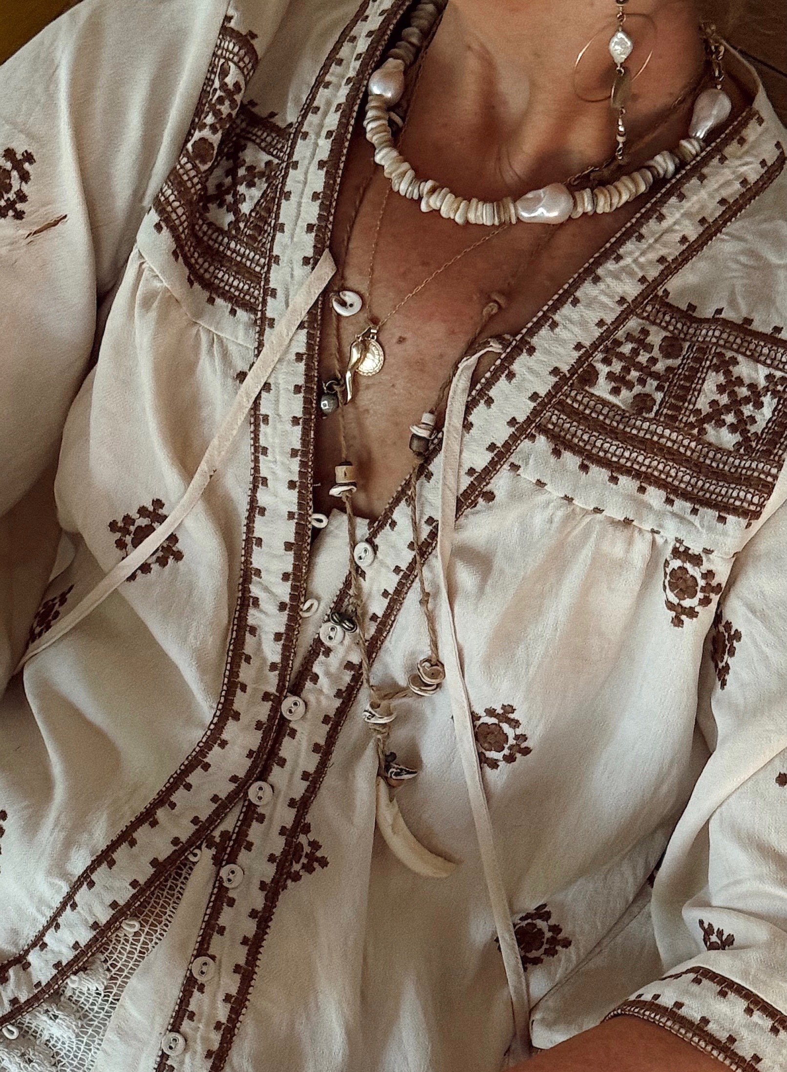 Castaway Tusk Necklace styled with Boho shirt