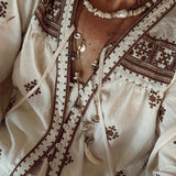 Castaway Tusk Necklace styled with Boho shirt