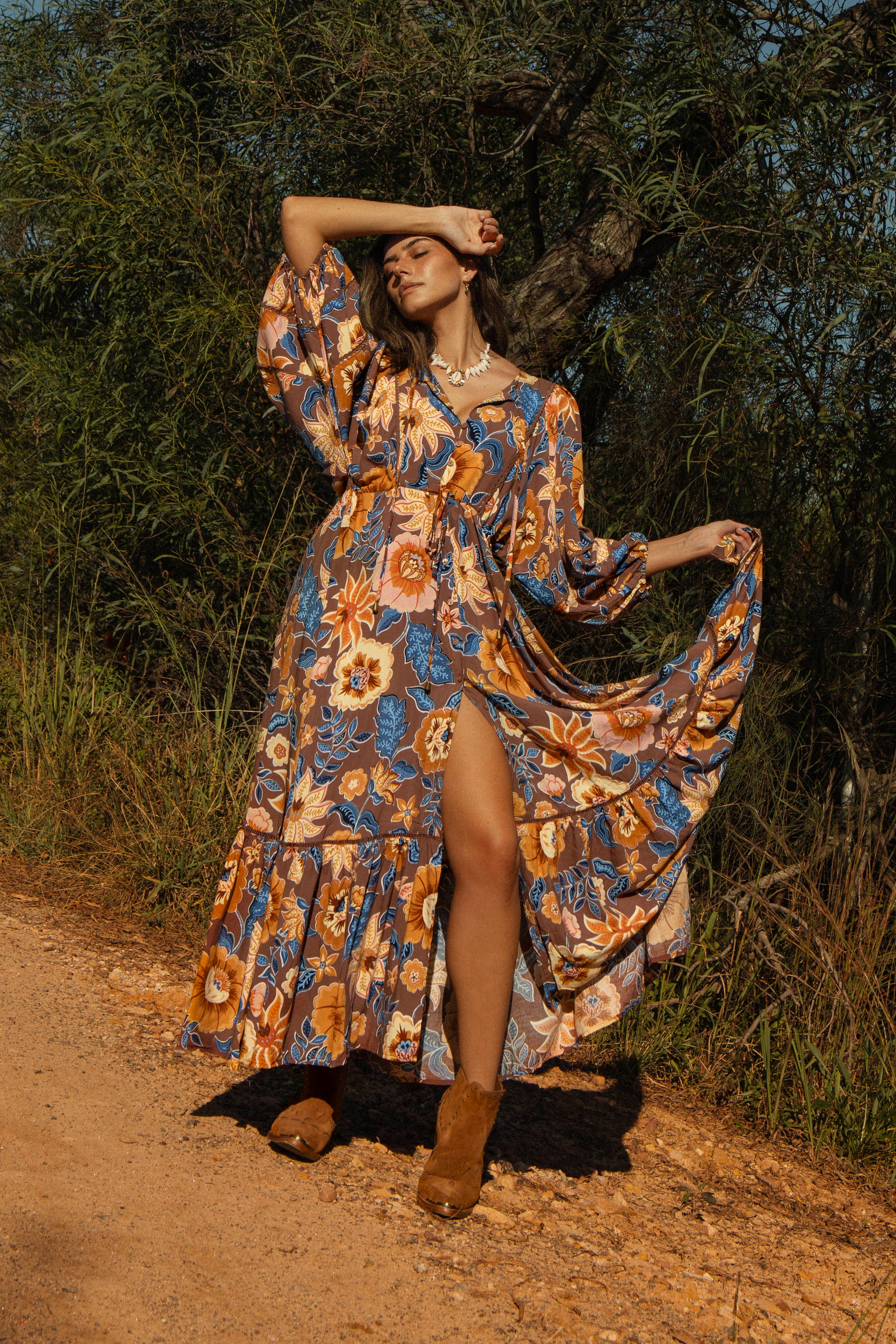 Catalonia Maxi - Tierra. Boho style maxi dress with floral pattern featuring earthy shades of brown, peach and blue.