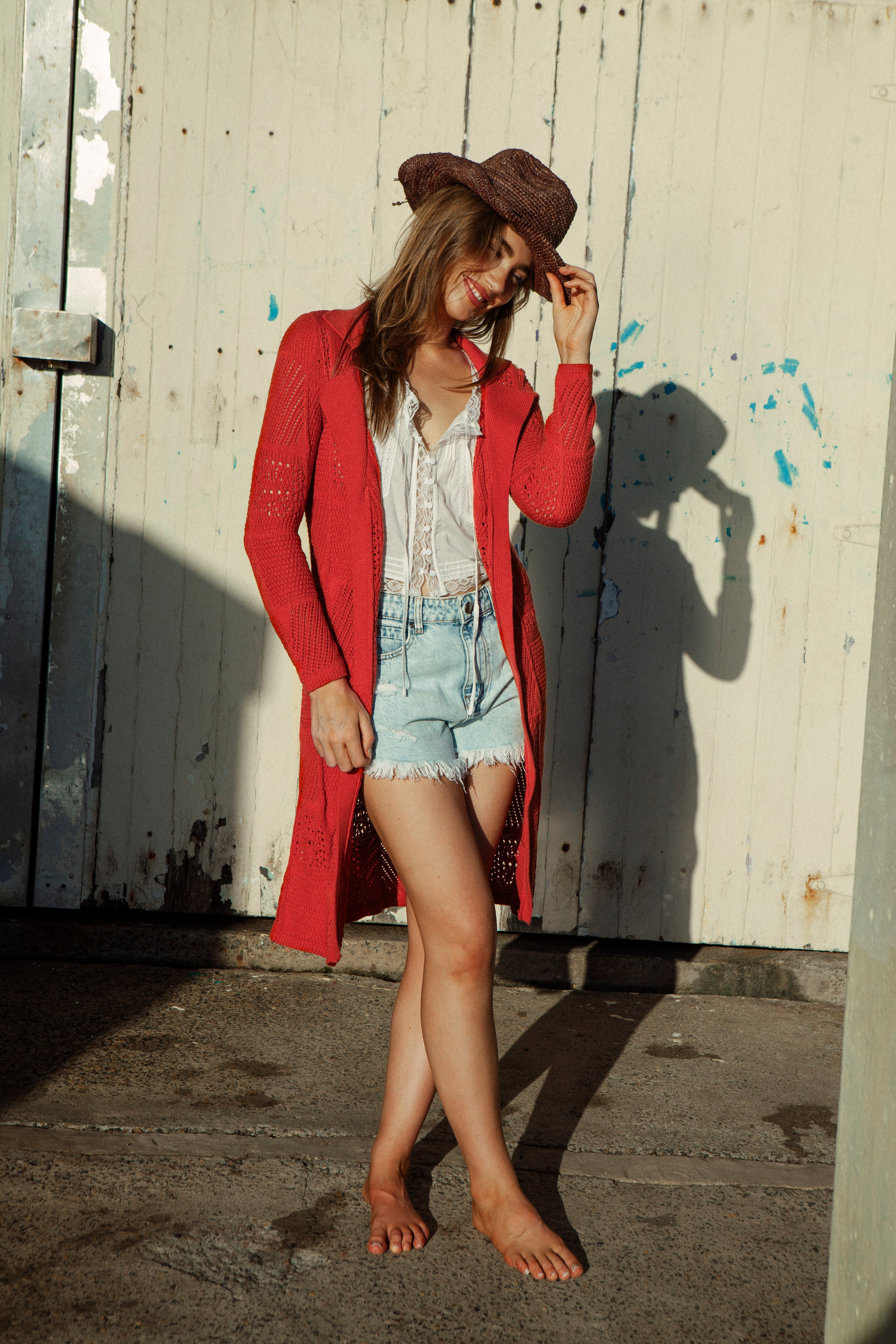 Cinder A-line Cardigan Rust. Long length cardigan in burnt orange colourway.