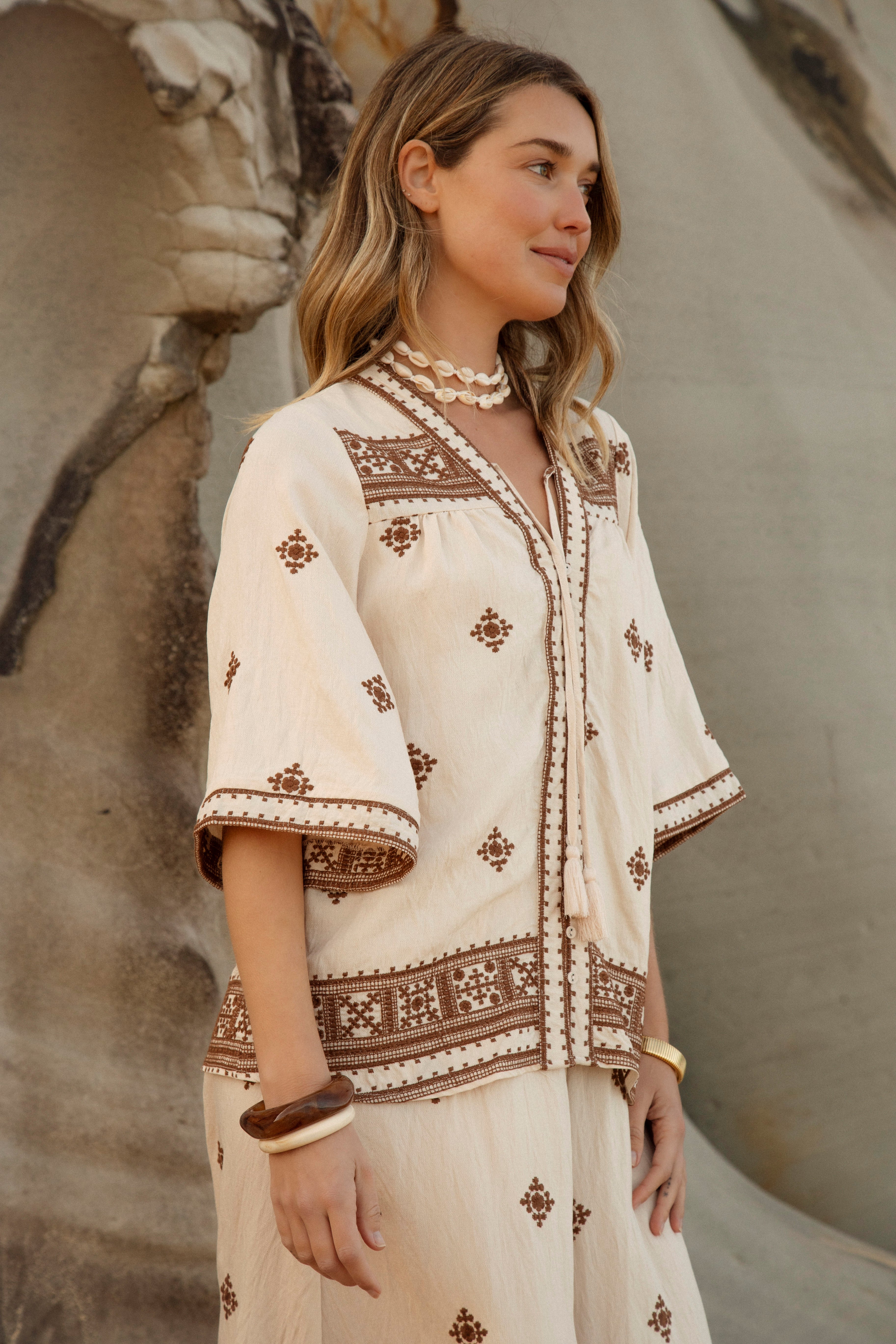 Coco Blouse - Boho inspired cream blouse with brown embroidered pattern.