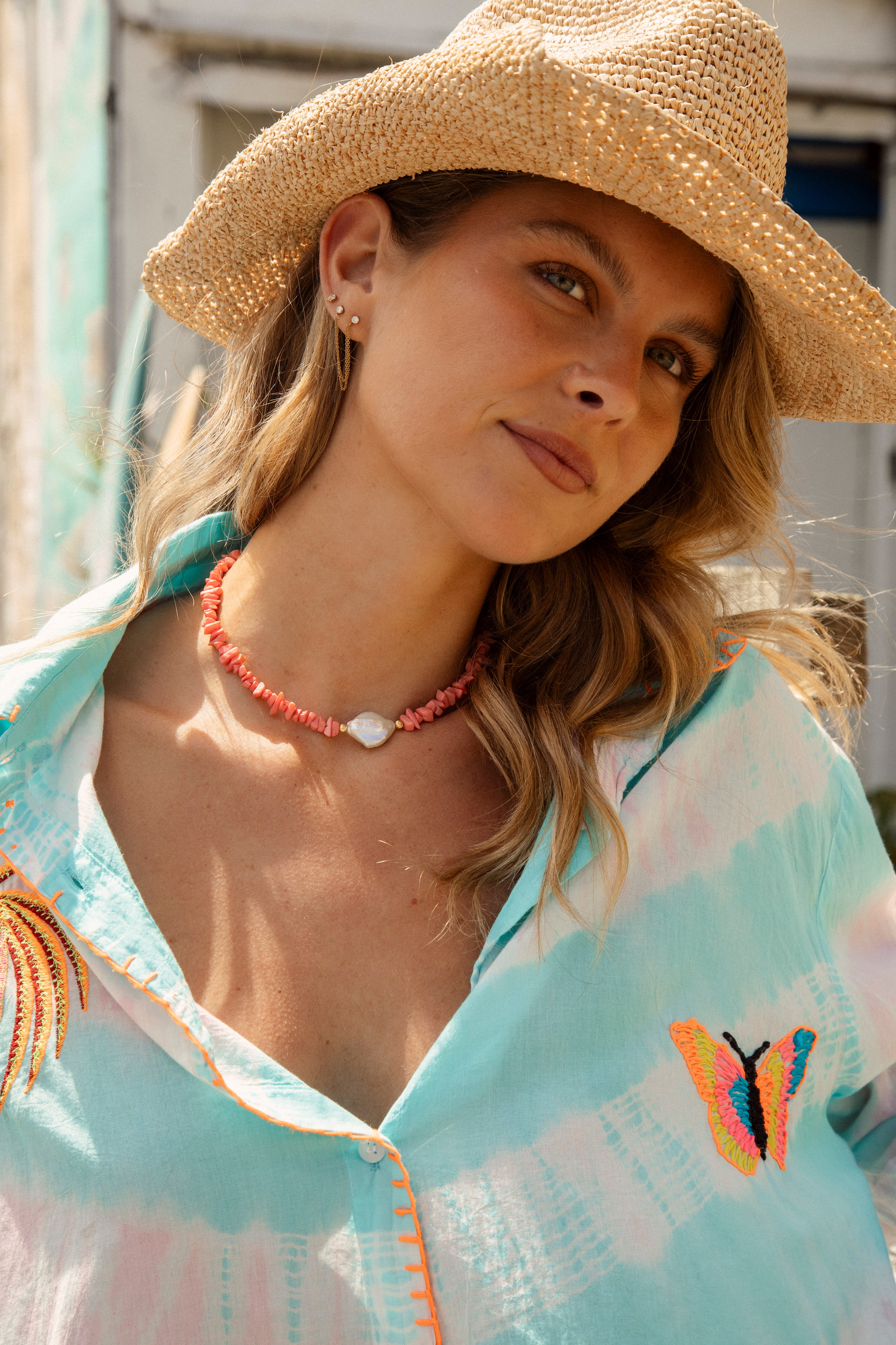 Cora Freshwater Pearl Choker features coral coloured glass beads and statement freshwater pearl