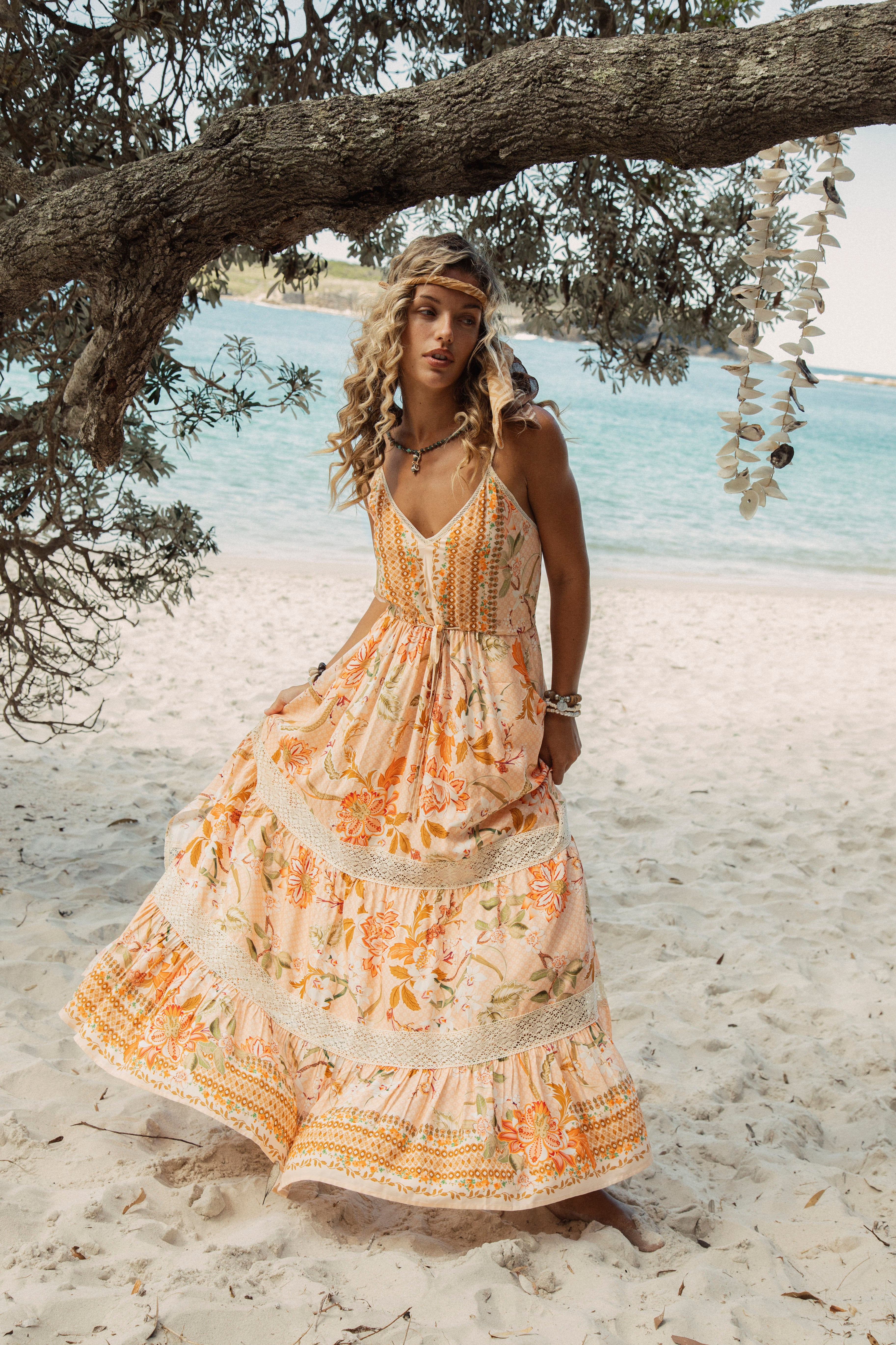 Coral Sands Sundress featuring spaghetti straps, lace details and tiered style