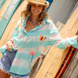 Cosmo Shirt Aquamarine - long sleeve stripe short in white and blue featuring embroidered motifs of palm trees and butterflies.