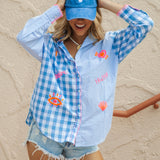 Cosmo Shirt Blue Check features contrasting check and stripe pattern and brightly coloured embroidered motifs
