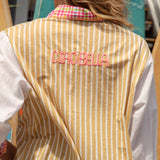 Cosmo Shirt Sandy - rear view showcasing 'ciao bella' motif on striped pattern.