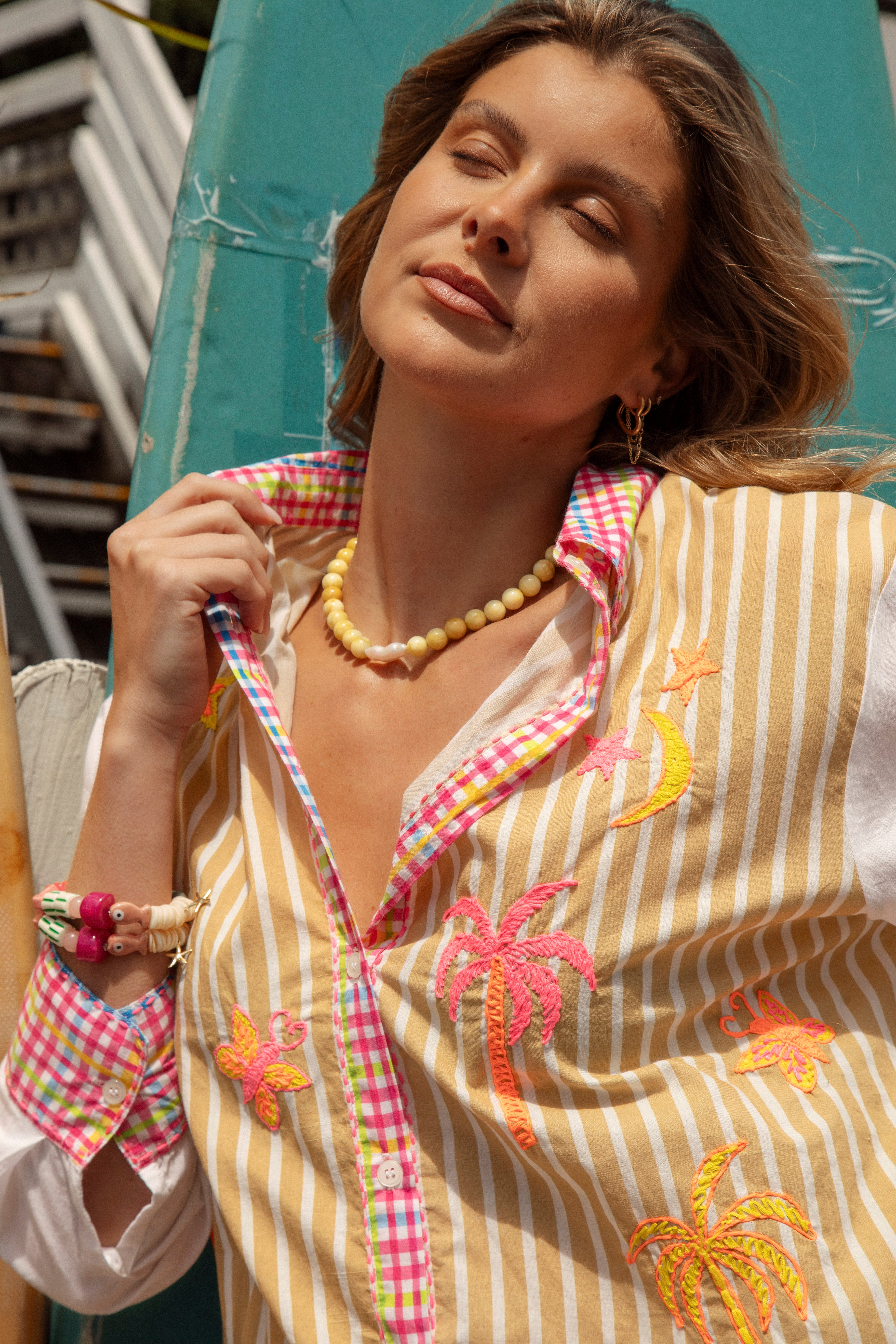 Cosmo Shirt Sandy showcasing contrasting gingham trim on striped shirt.