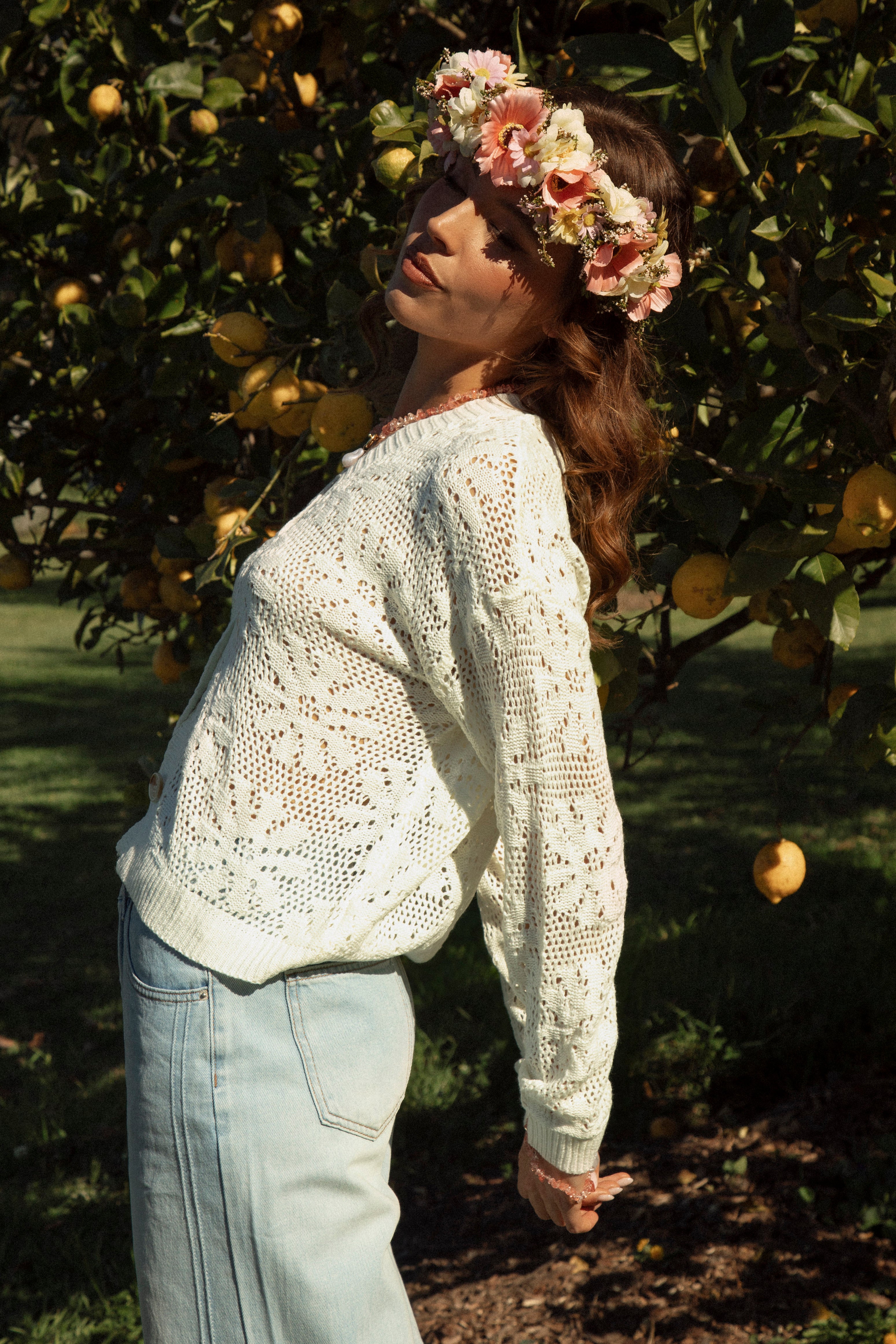 Daisy Lane Cardigan showcasing open weave knit in floral design