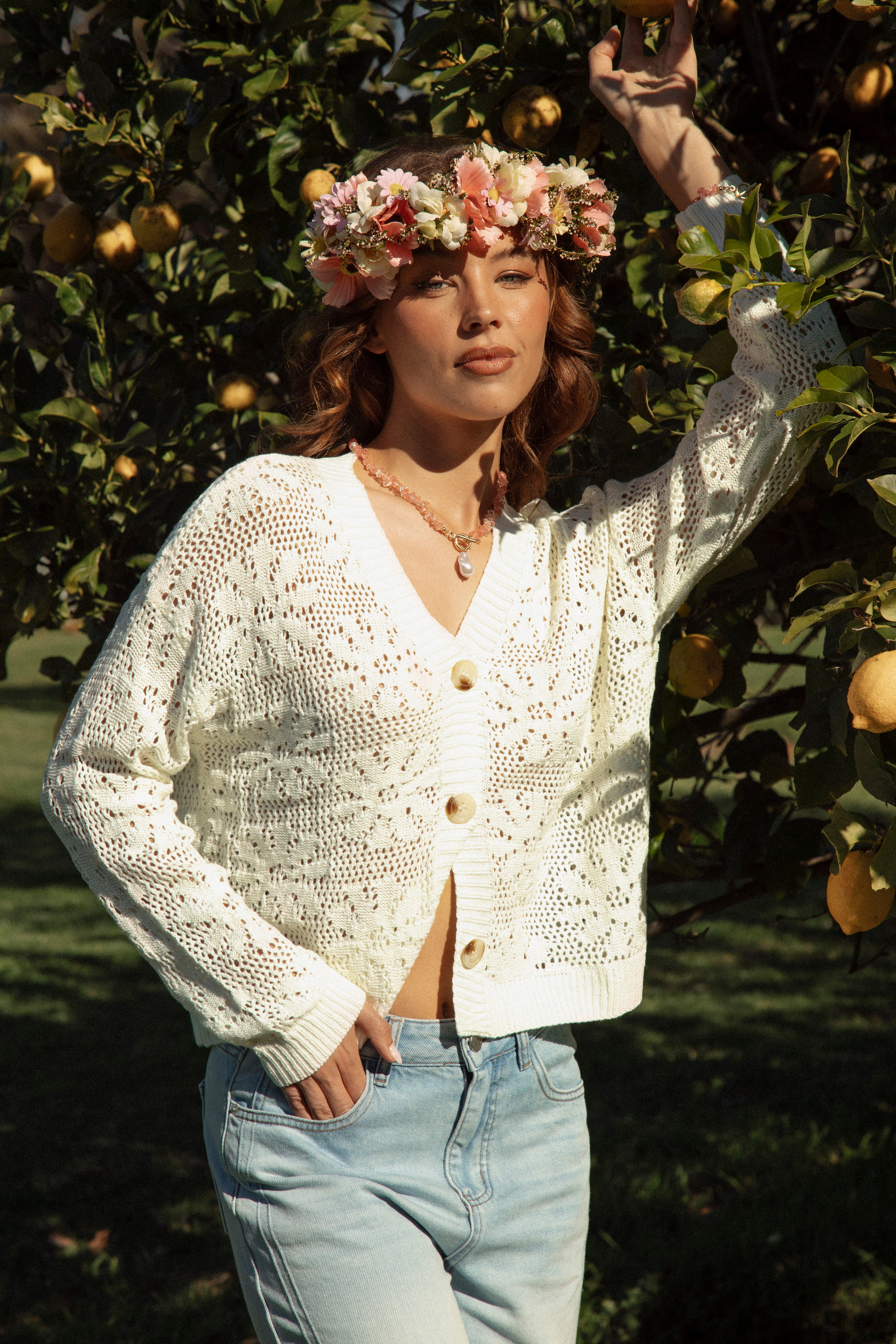 Daisy Lane Cardigan showcasing button down style and cropped length