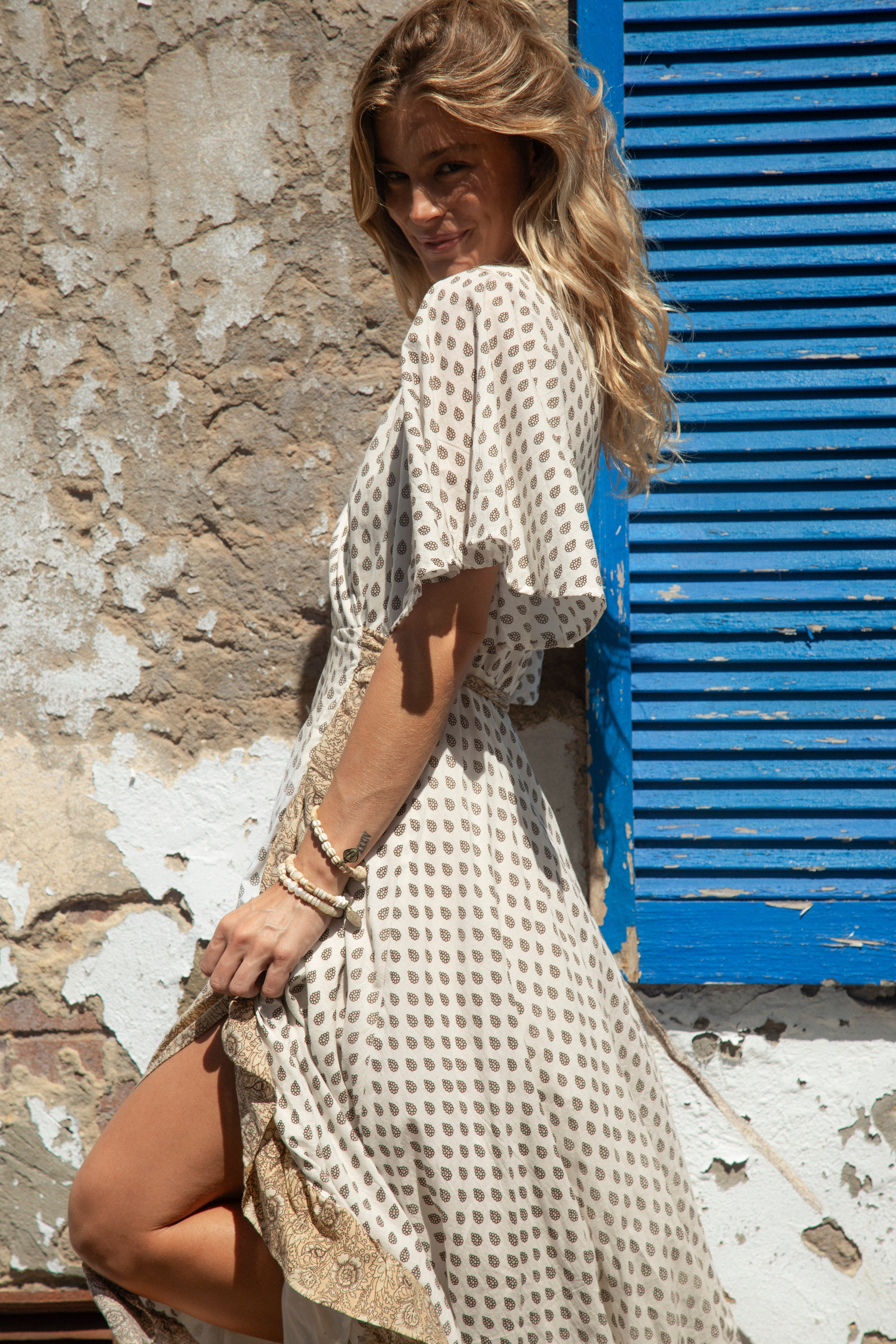 Daisy Wrap Dress Saffron Side View featuring Boho style pattern 