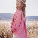 Desert Jacket Flamingo - pink denim jacket side view.