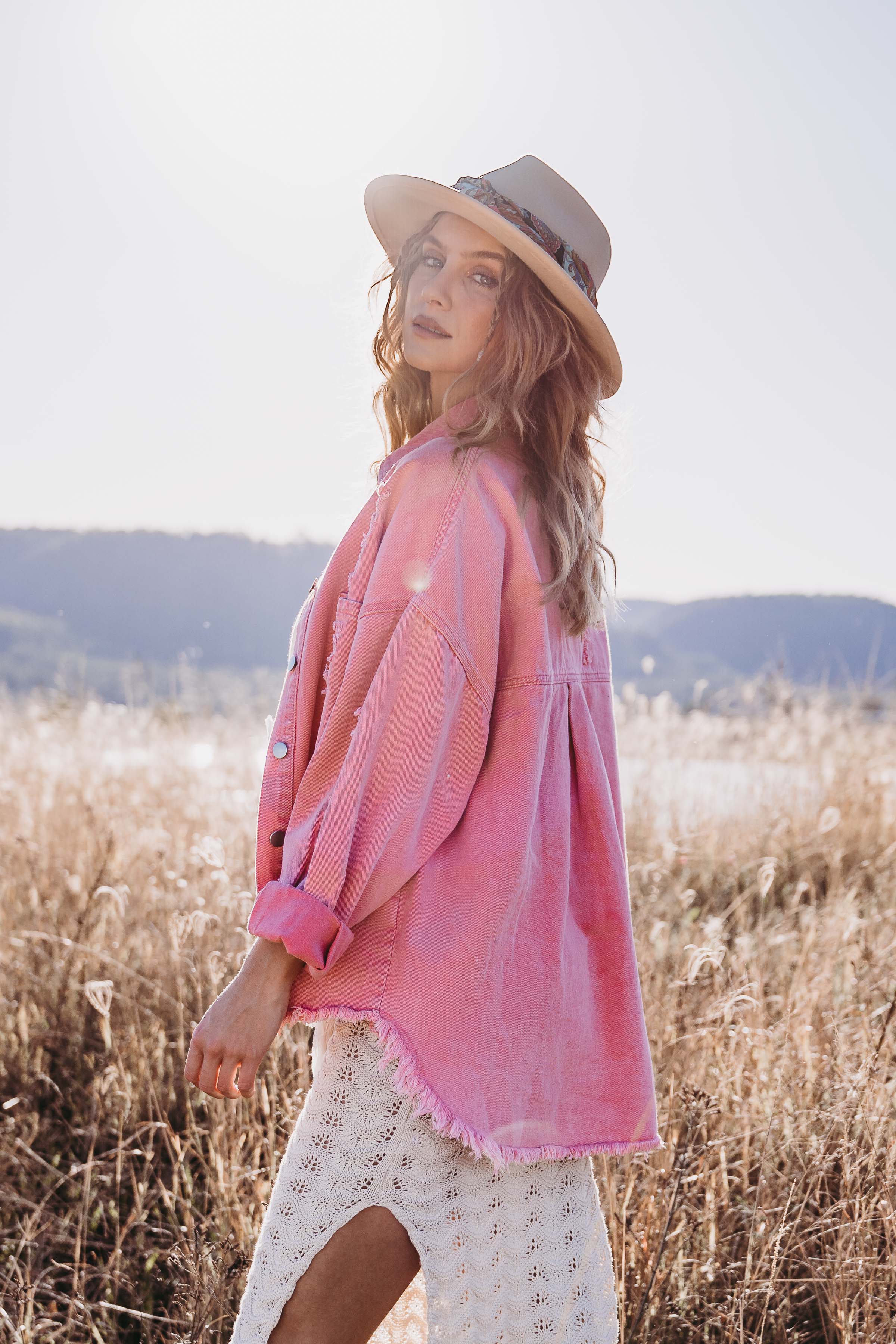 Desert Jacket Flamingo - pink denim jacket side view.