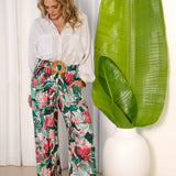 Donatella Pant - Bohemian Pants featuring floral print in shades of pink, green and aqua.