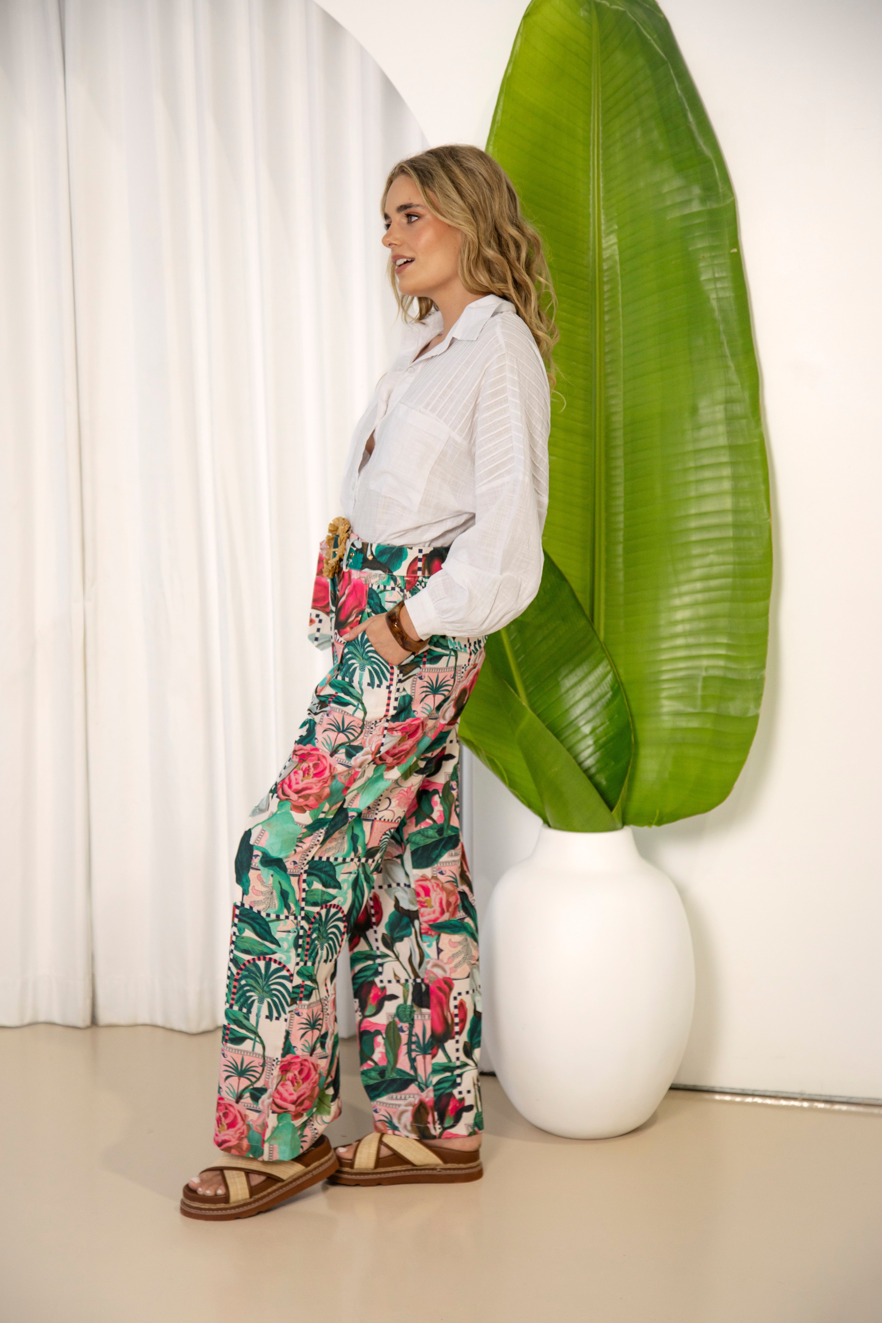 Donatella Pants showcasing floral print and pockets