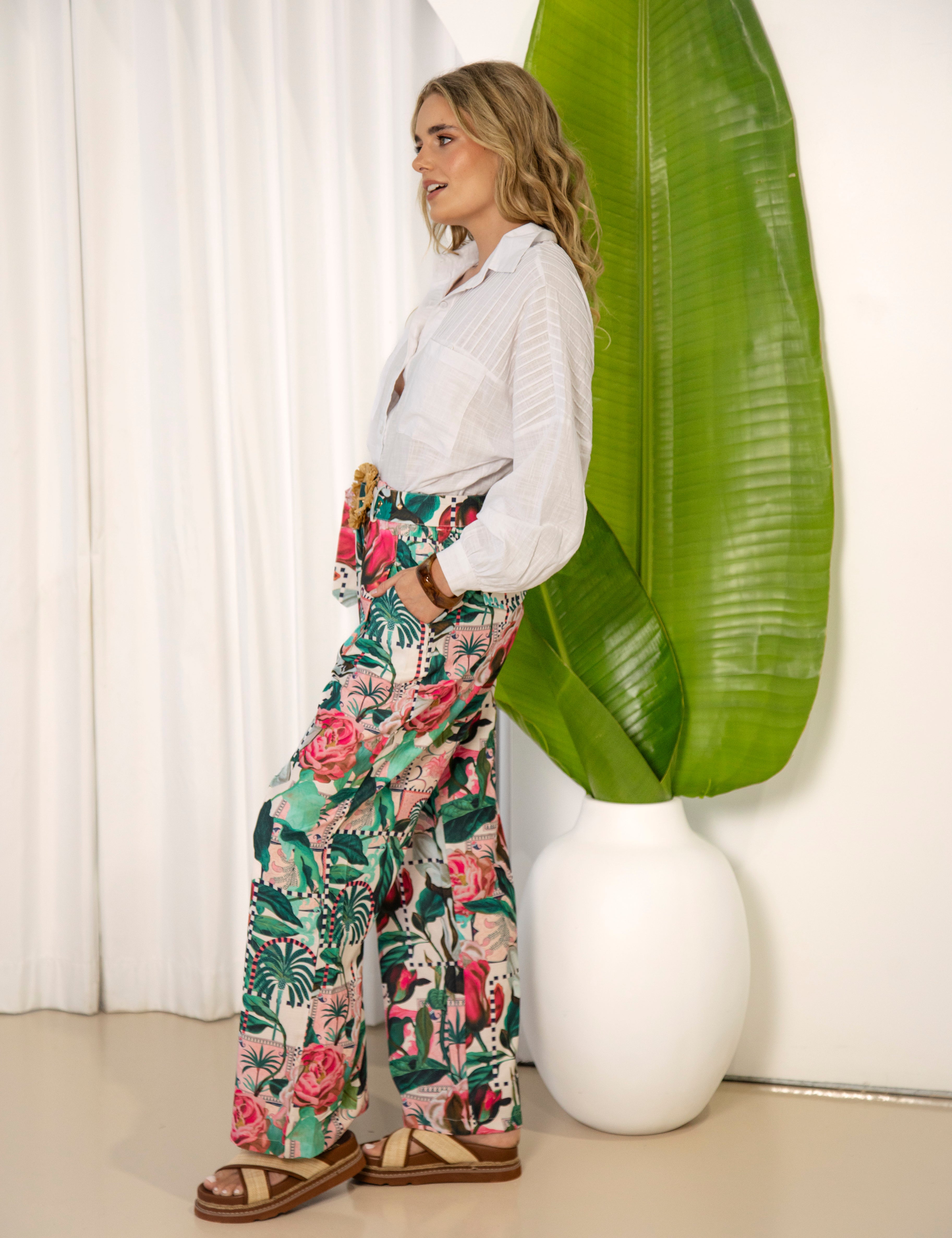Donatella Pants showcasing floral print and pockets