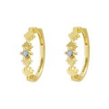 Night Glow Blue Topaz Huggies Gold