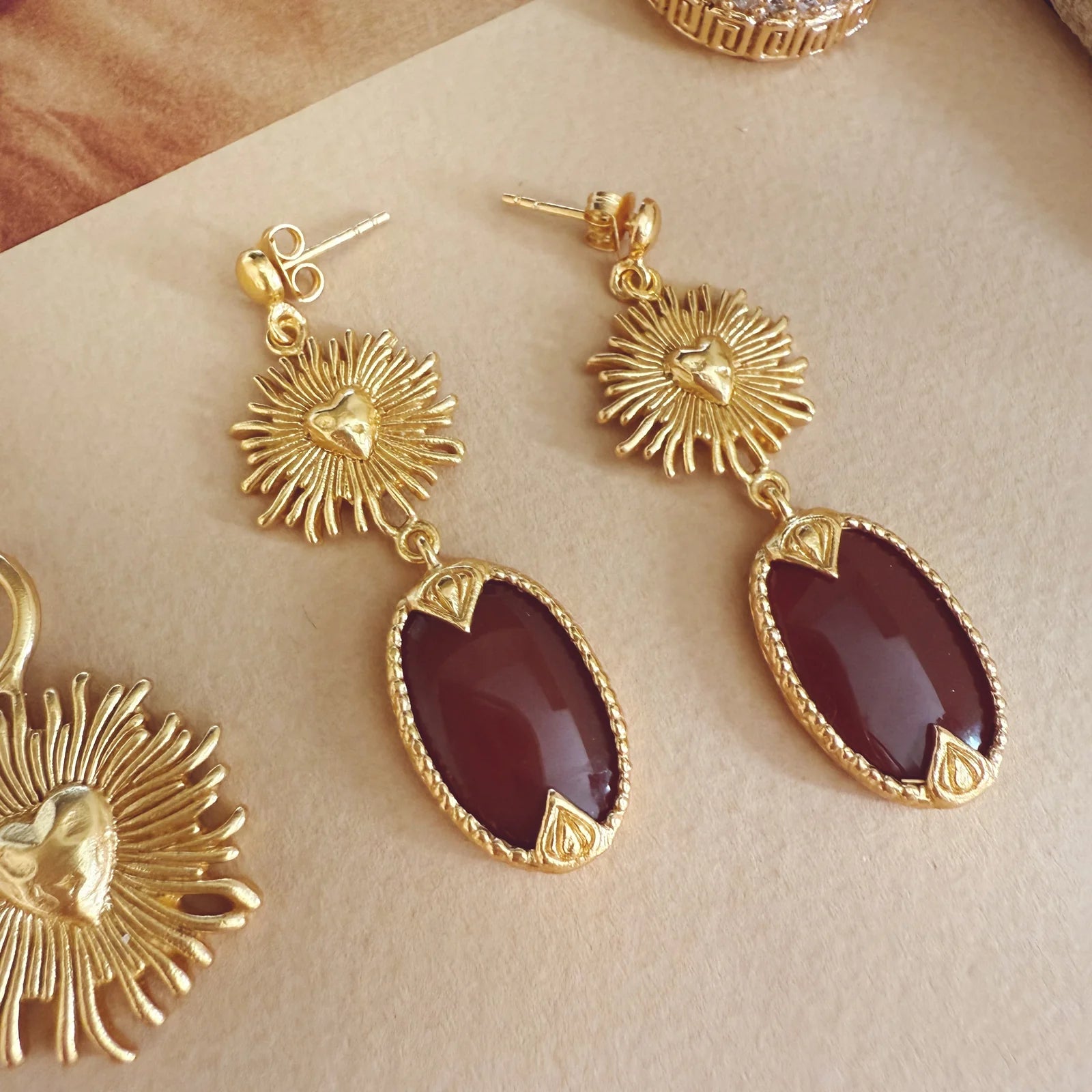 Emberlyn Earrings - stud fixings with drop detail of gold and red jewel