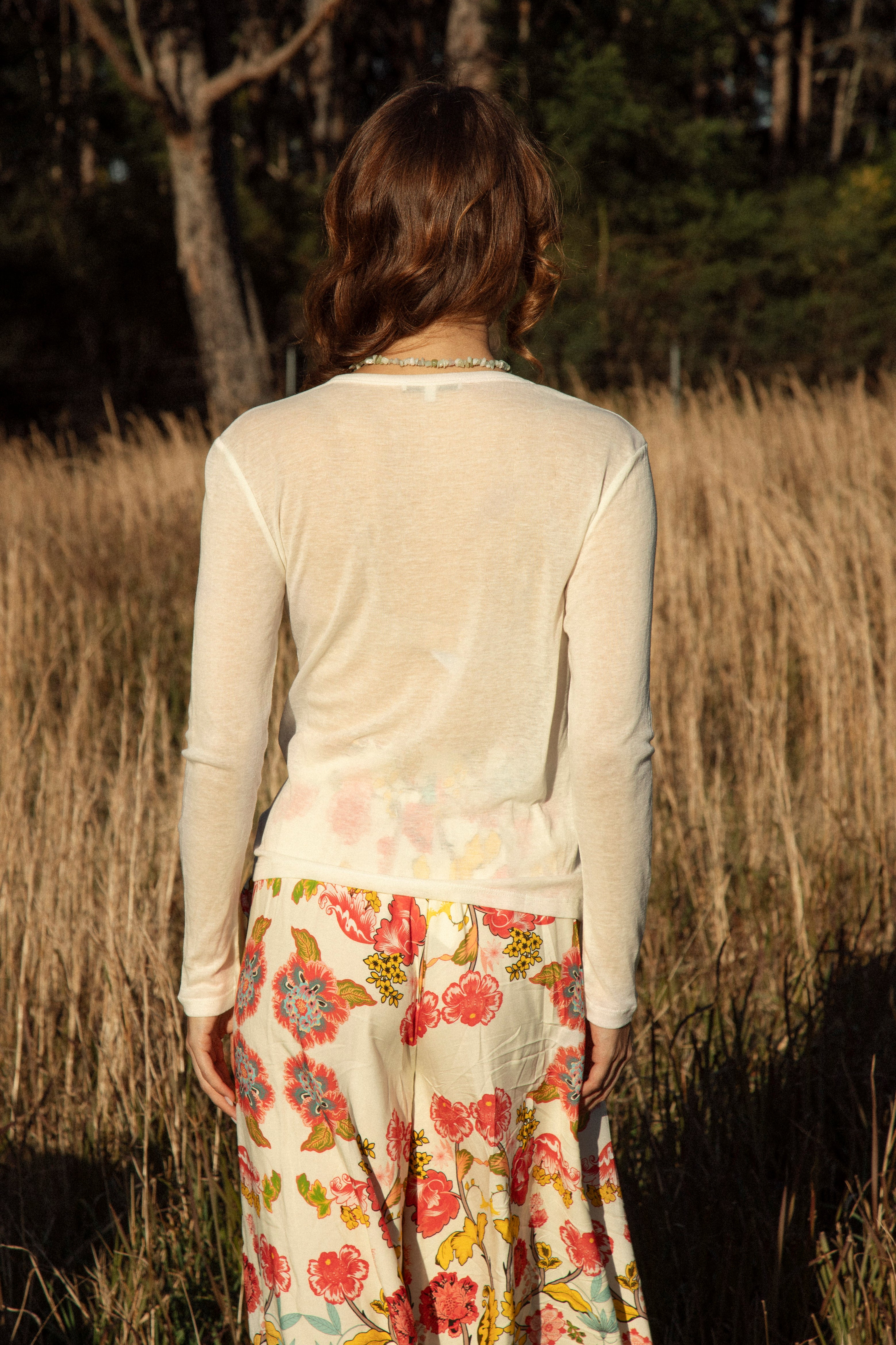 Essential Long Sleeve Tee - rear view showcasing fitted style