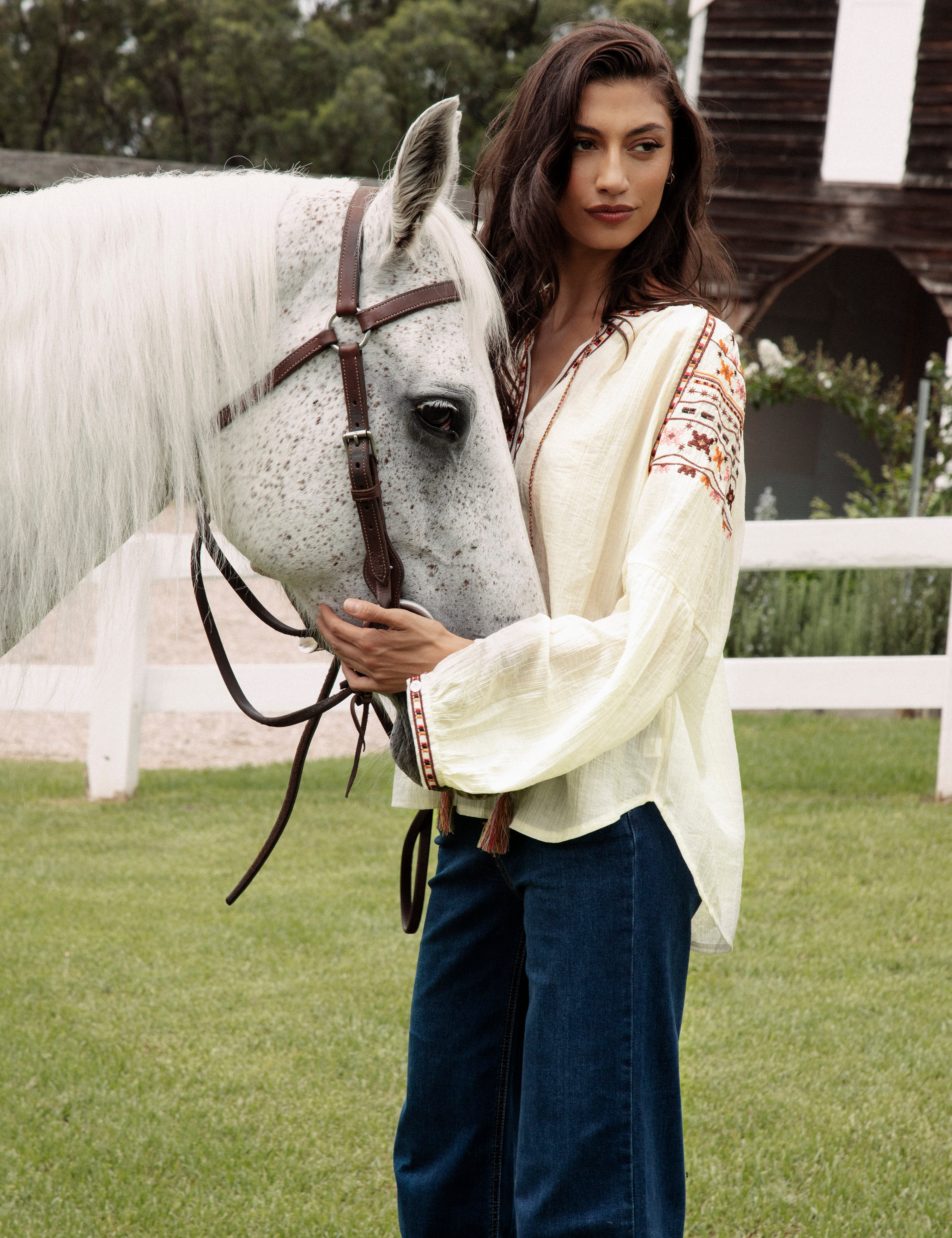 Eve Embroidered Blouse featuring delicate embroidery at cuffs, sleeves and neckline.