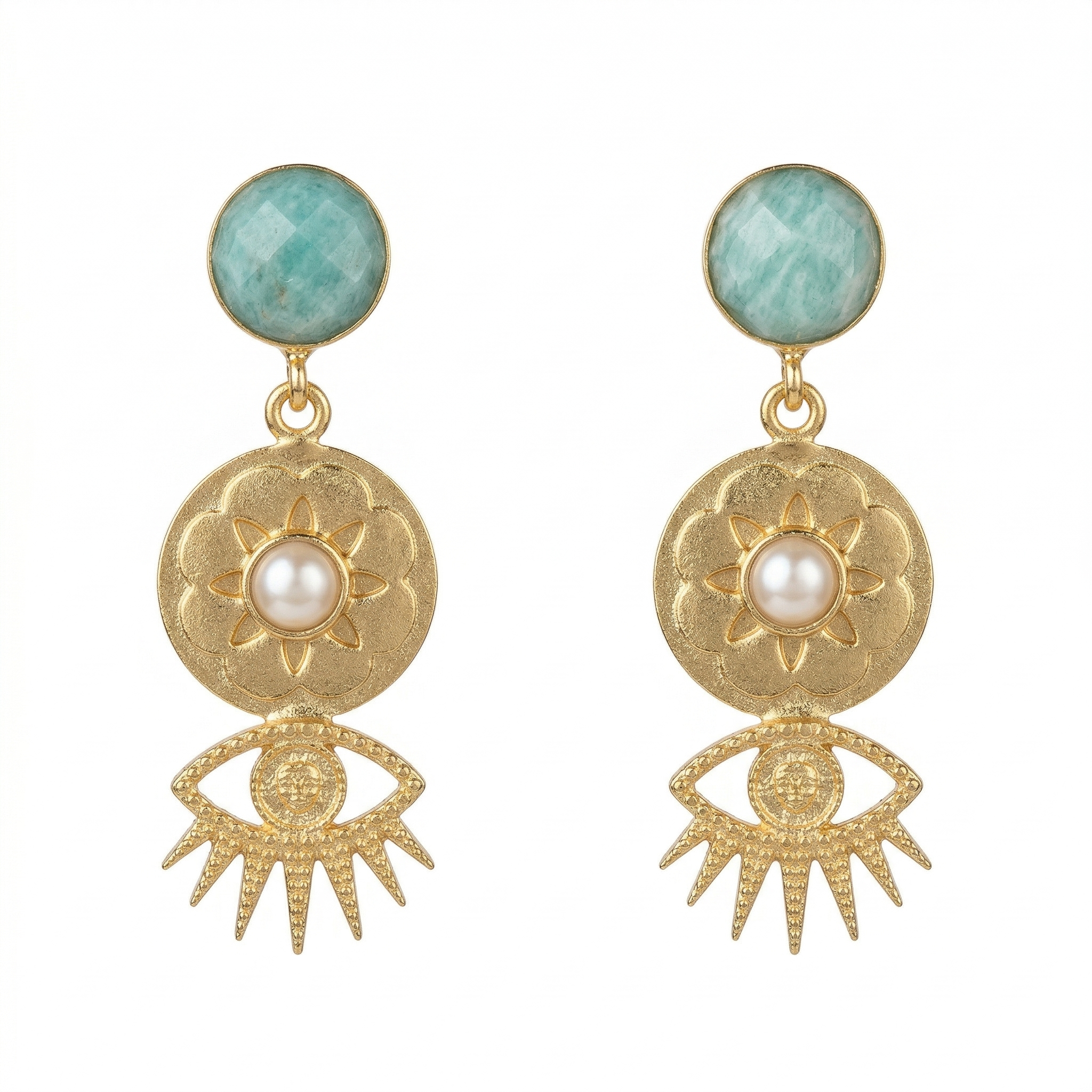 Gold earrings with turquoise stones and pearl-like centers on a white background