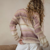 Fawna Sweater - rear view showcasing striped pattern and frayed detail.