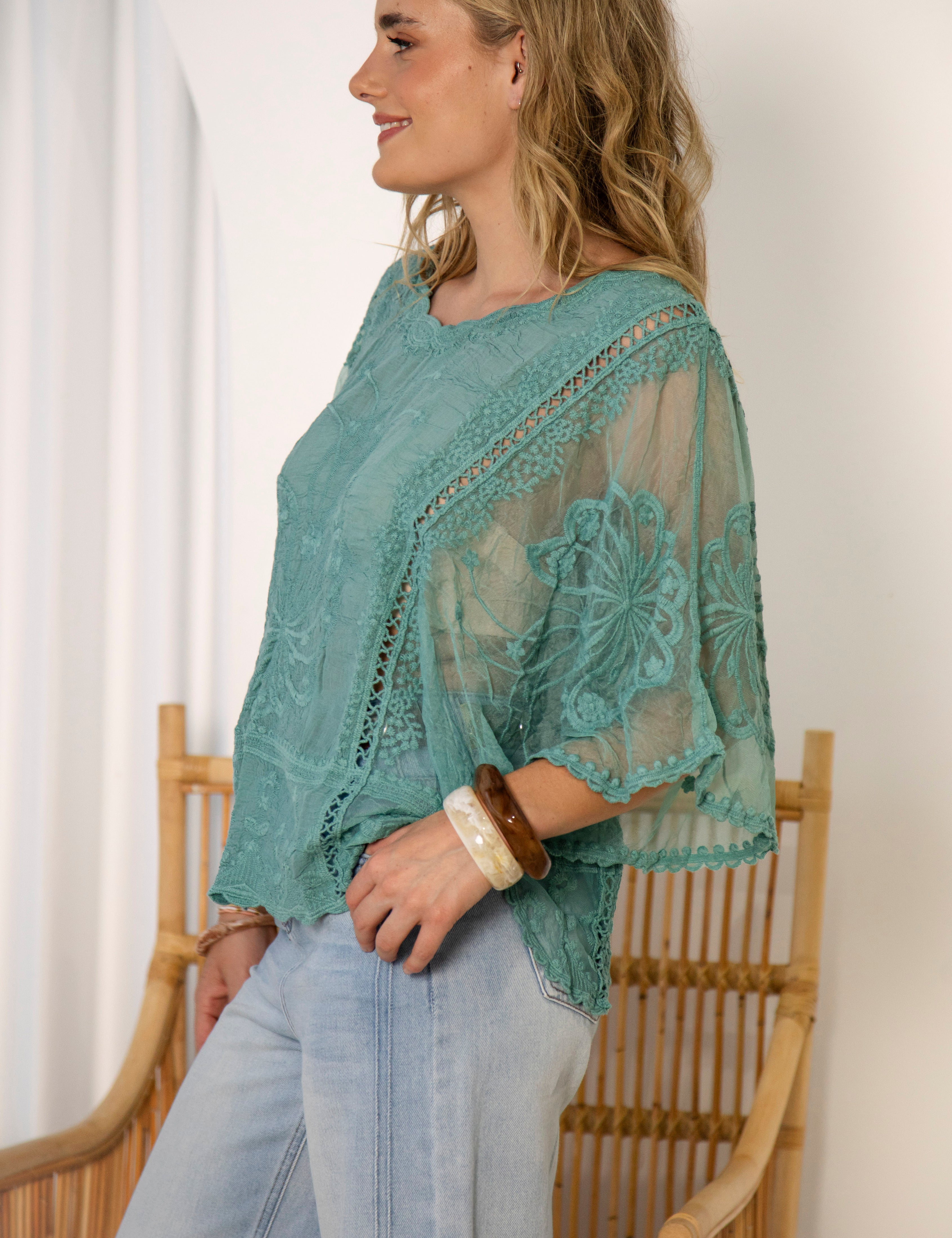 Faye Lace Top Fern - side view showcasing sheer fabric and lace details