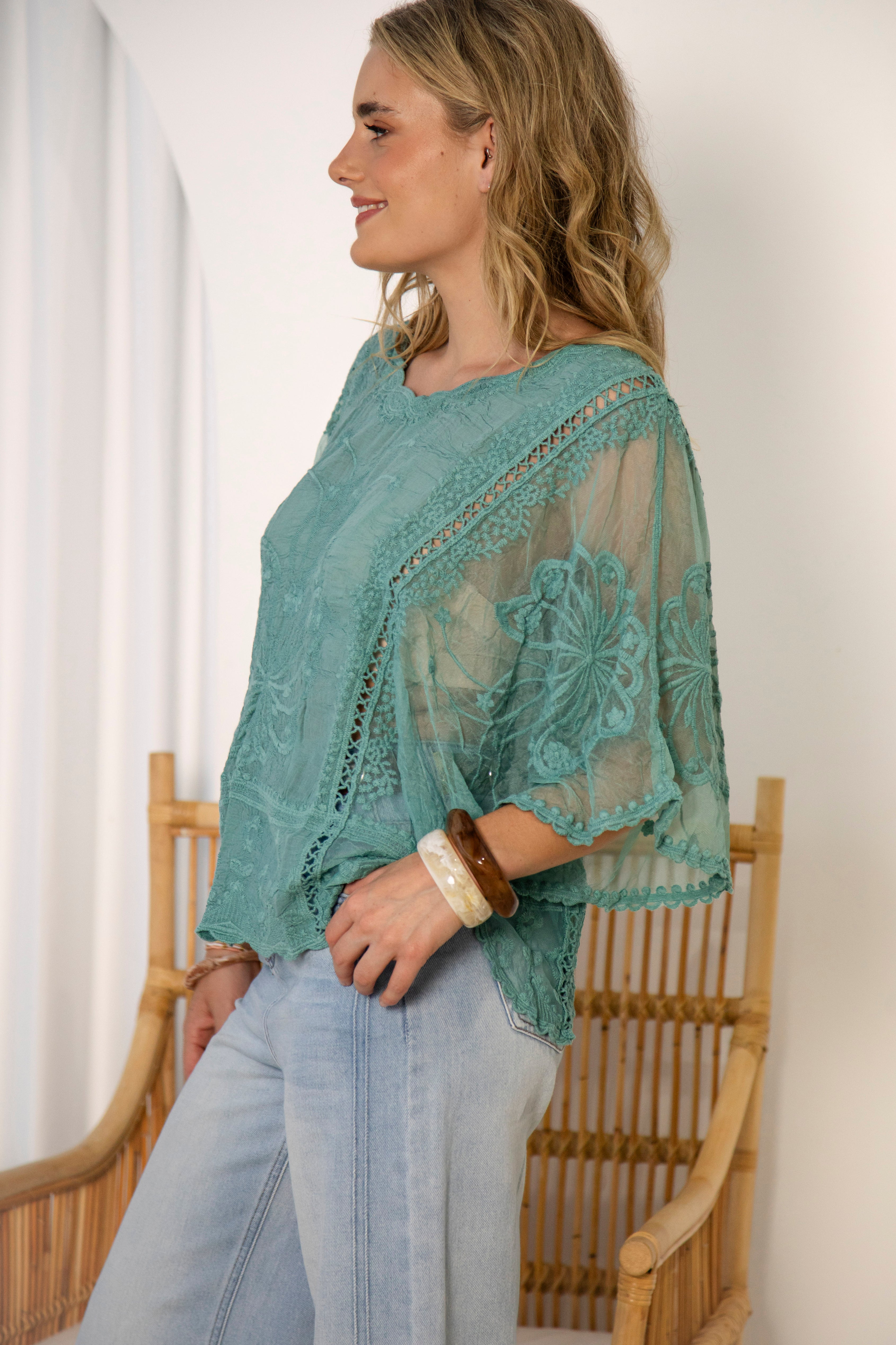 Faye Lace Top Fern - side view showcasing sheer fabric and lace details