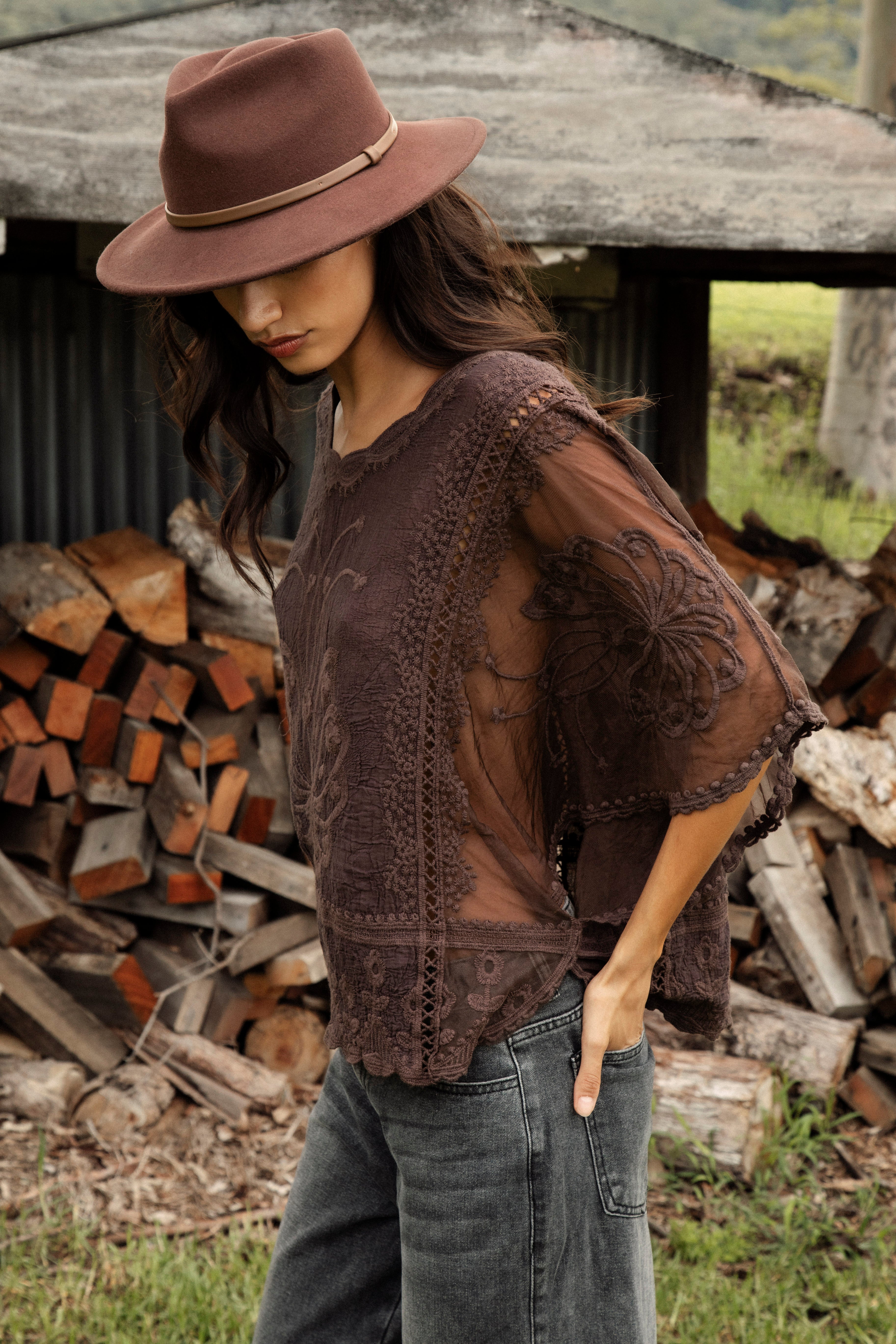 Faye Lace Top Mahogany. Side View showcasing sheer lace detail at side and sleeve.